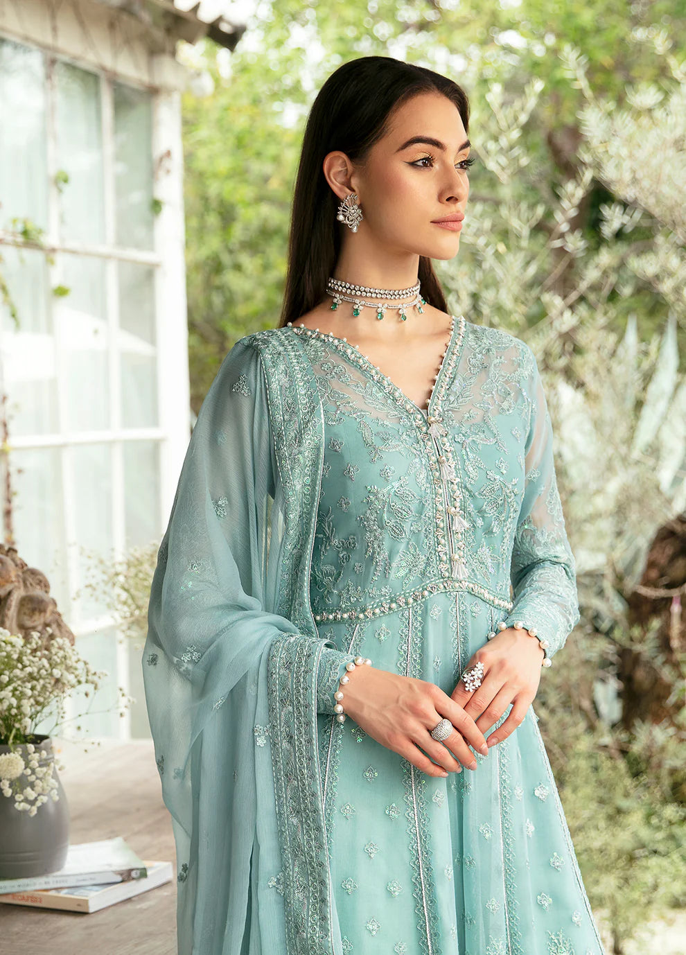 Model wearing Gulaal Iveria sea green chiffon Eid dress, Suffuse detailing, exclusive Pakistani clothes UK.