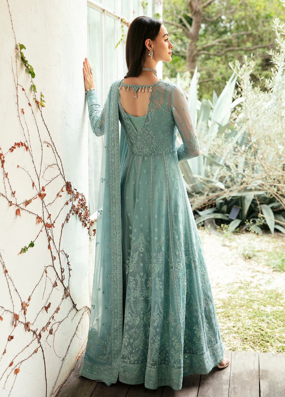 Model wearing Gulaal Iveria sea green chiffon Eid dress, Suffuse detailing, exclusive Pakistani clothes UK.