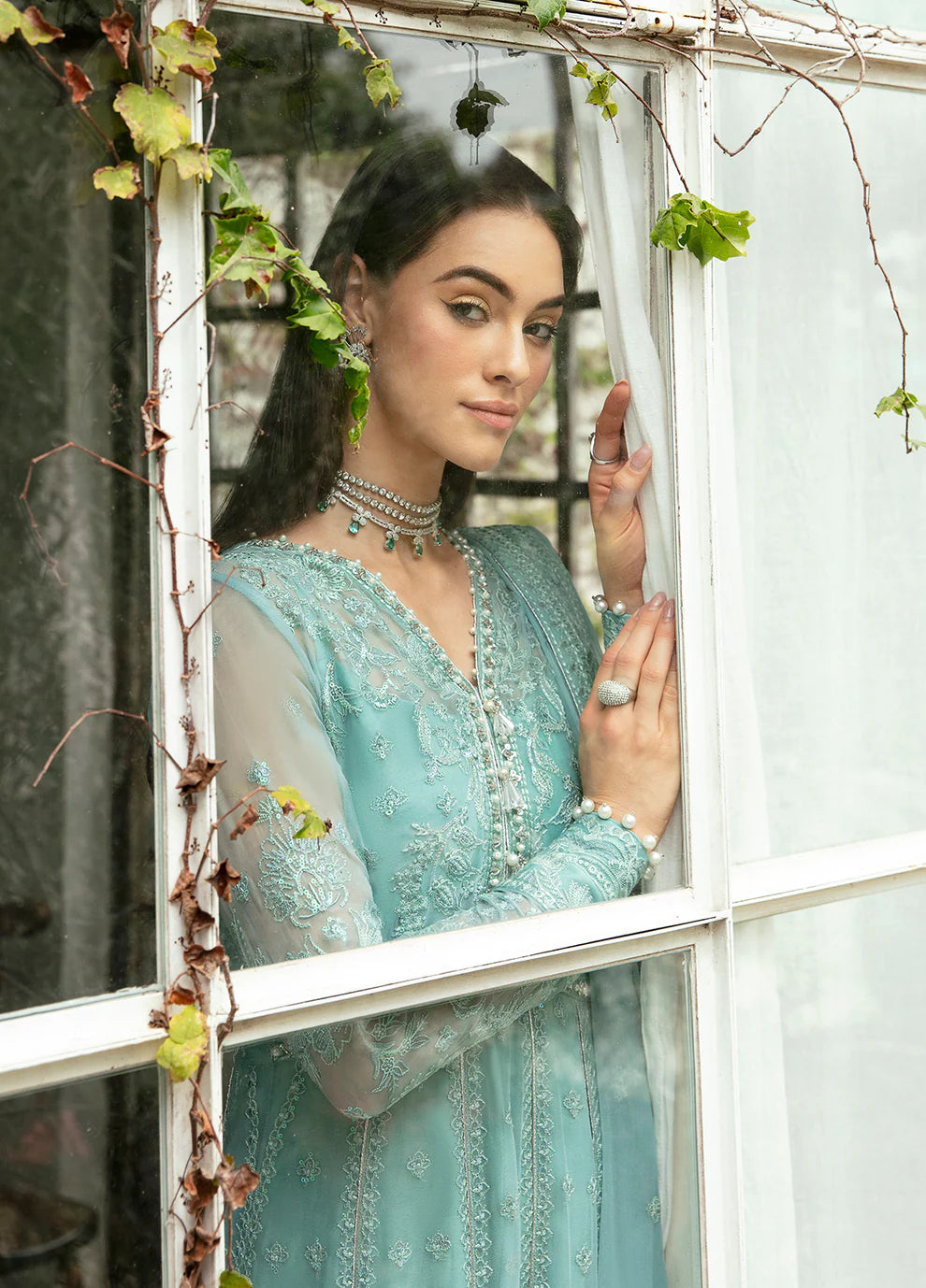 Model wearing Gulaal Iveria sea green chiffon Eid dress, Suffuse detailing, exclusive Pakistani clothes UK.