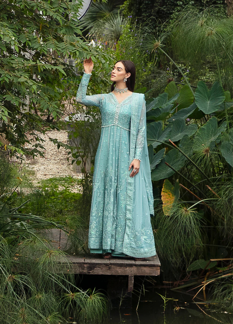 Model wearing Gulaal Iveria sea green chiffon Eid dress, Suffuse detailing, exclusive Pakistani clothes UK.