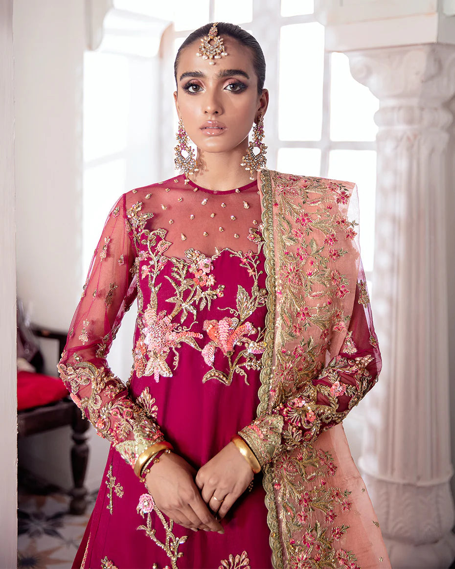 Model in Gulaal UK CHAMELI, magenta embroidered net formal suit, Meherma Wedding Formals.