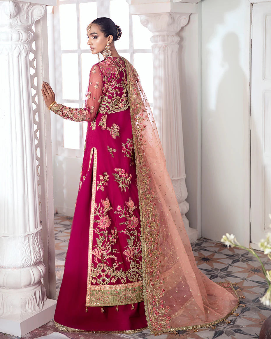 Model in Gulaal UK CHAMELI, magenta embroidered net formal suit, Meherma Wedding Formals.
