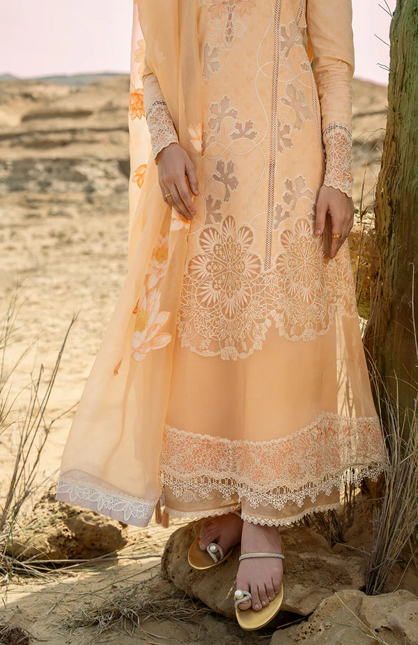 Model wearing peach embroidered dress with matching dupatta from Soraya Noa Summer Casual Pret 2025 Fresco. Pakistani luxury pret UK.