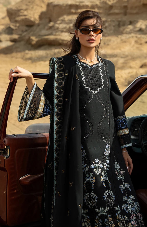 Model wearing black embroidered dress with detailed sleeves and dupatta from Soraya Noa Summer Casual Pret 2025 Mavro. Pakistani clothes online UK.