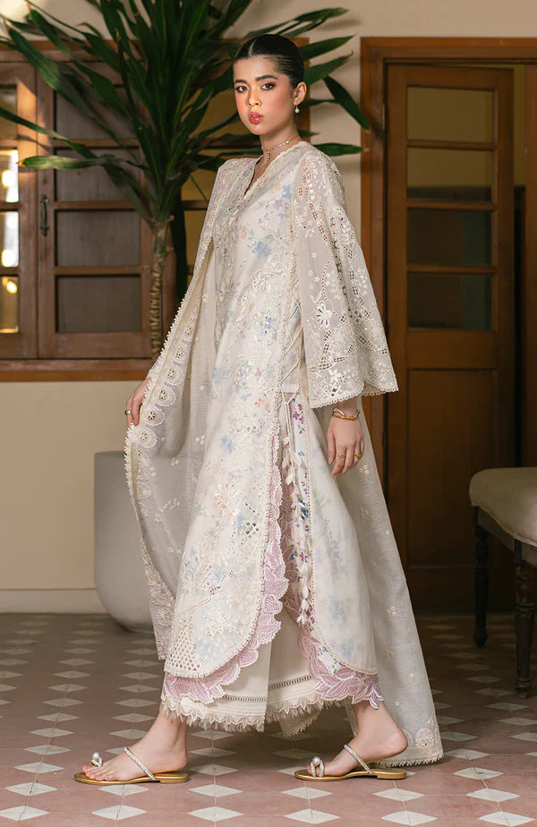 Model wearing off-white floral embroidered dress with lace sleeves and pastel accents from Soraya Noa Summer Casual Pret 2025 Bianca. Pakistani clothes online UK.