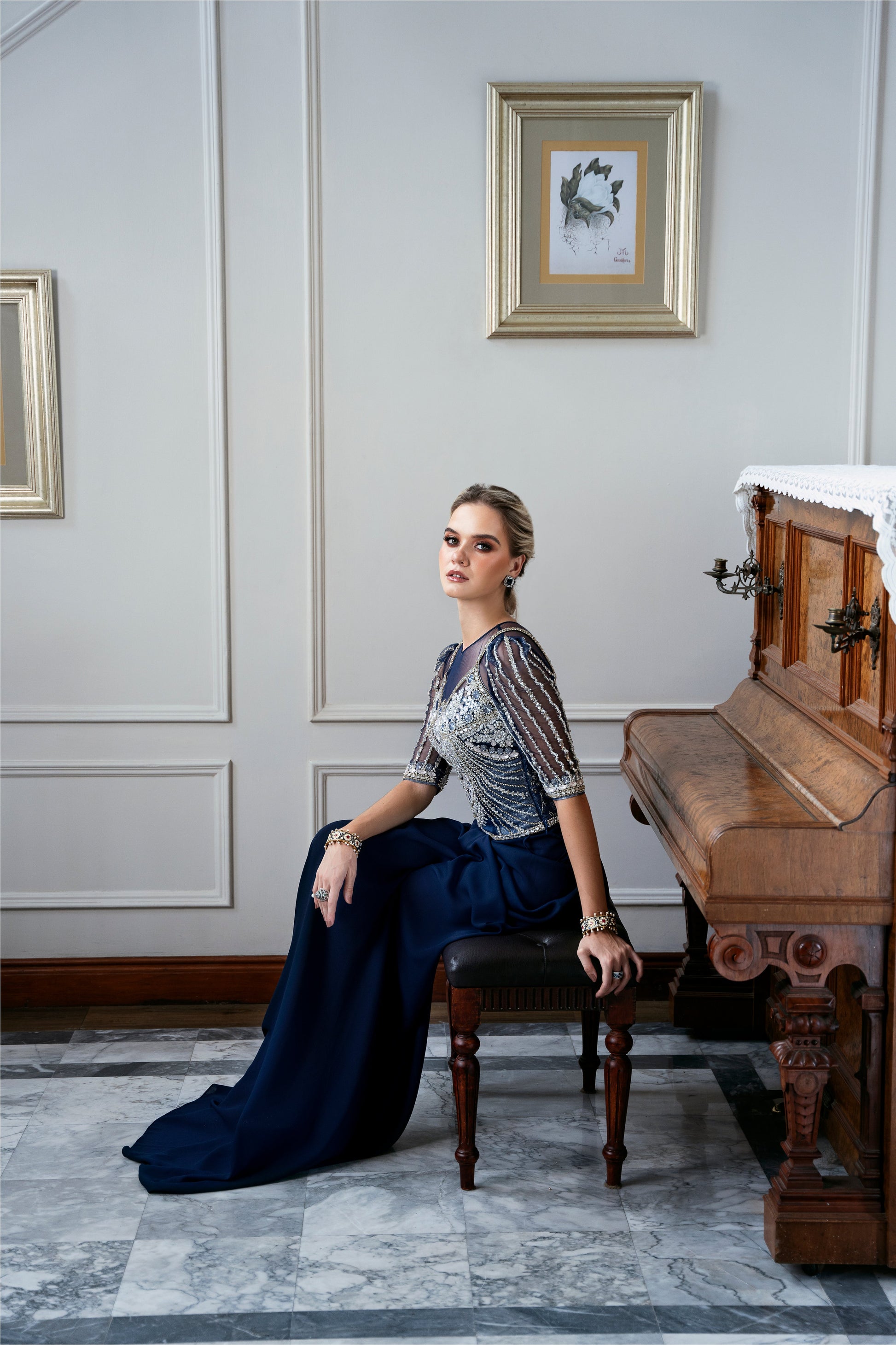 Model wearing Bluebell from Mysie by Tahira, a luxurious navy blue outfit with intricate beaded details, perfect for Pakistani luxury pret in the UK.