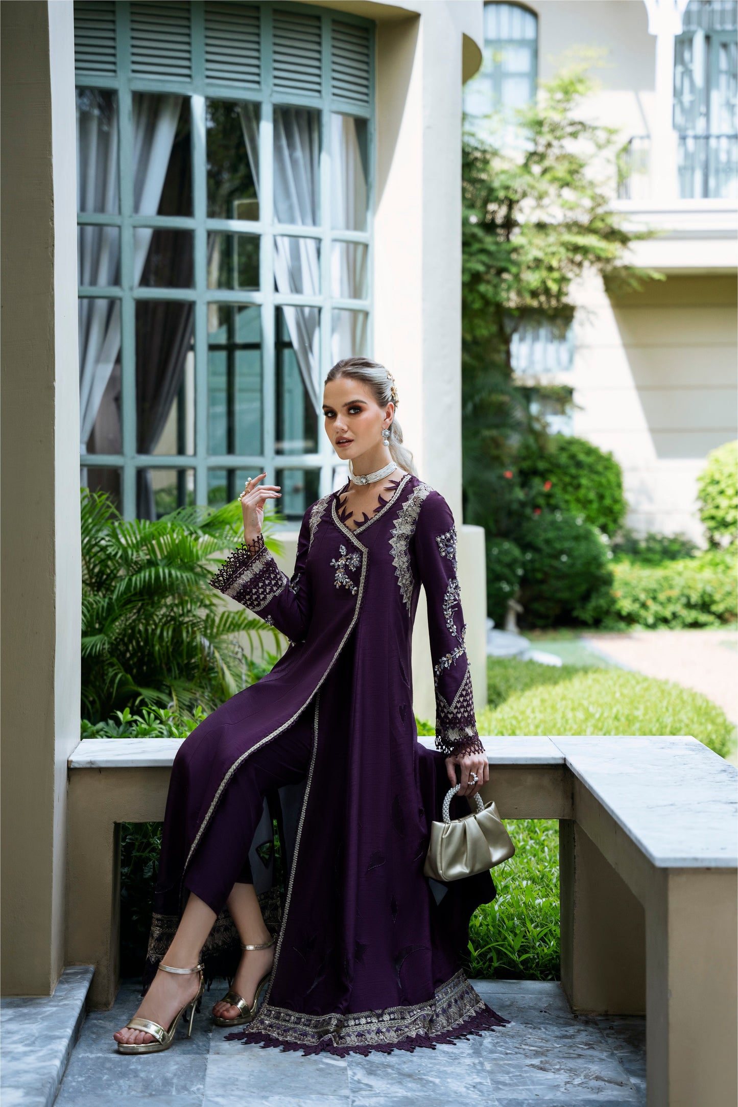 Model wearing Jamini from Mysie by Tahira, a purple embellished dress with a modern silhouette, perfect for Pakistani luxury pret in the UK.