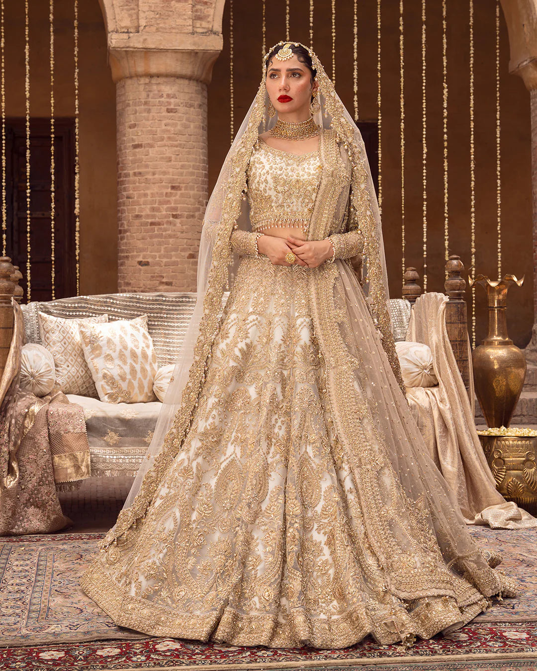 Model wearing cream and gold bridal dress Gelin by Faiza Saqlain, Pakistani luxury pret online in UK for wedding events.