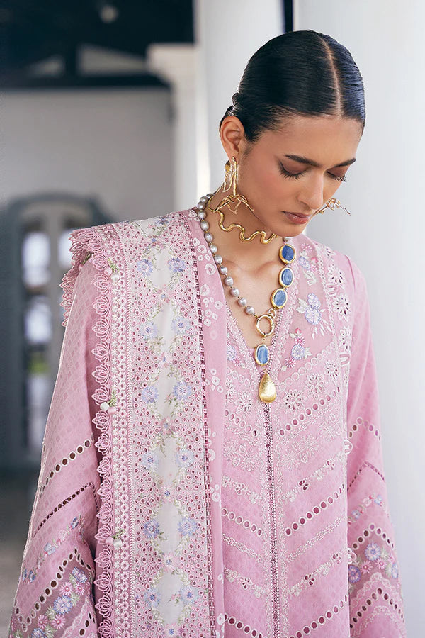 Model wearing pastel pink embroidered dress with intricate lace details from Suffuse Casual Pret 2025 Safar. Pakistani luxury pret in UK