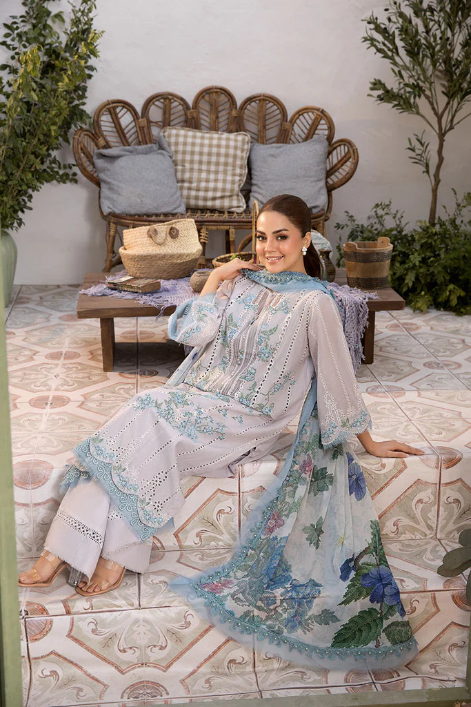 Model wearing Sobia Nazir Vital 2025 Design 2B in powder blue with delicate embroidery. Shop Pakistani luxury pret and Pakistani clothes online in UK.
