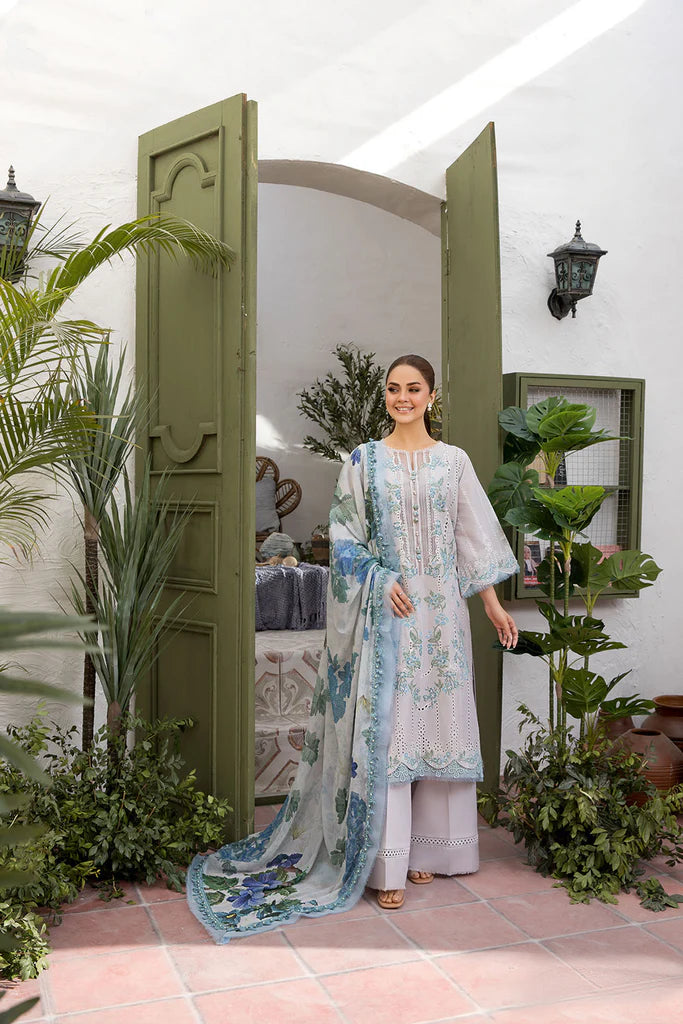 Model wearing Sobia Nazir Vital 2025 Design 2B in powder blue with delicate embroidery. Shop Pakistani luxury pret and Pakistani clothes online in UK.