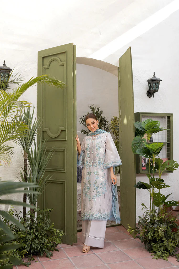 Model wearing Sobia Nazir Vital 2025 Design 2B in powder blue with delicate embroidery. Shop Pakistani luxury pret and Pakistani clothes online in UK.