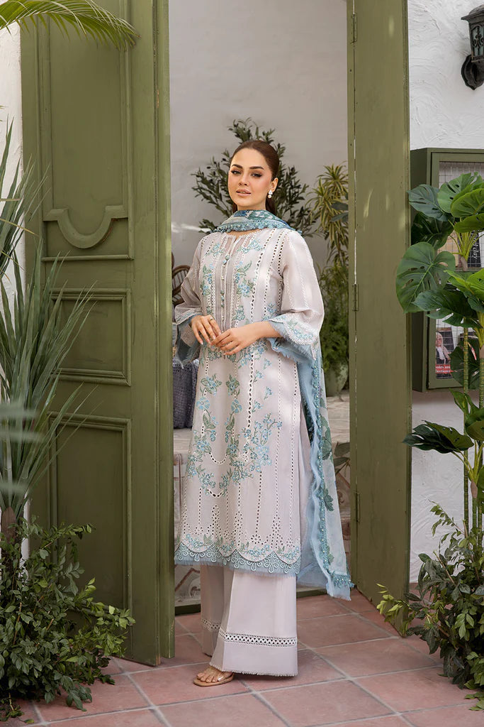 Model wearing Sobia Nazir Vital 2025 Design 2B in powder blue with delicate embroidery. Shop Pakistani luxury pret and Pakistani clothes online in UK.