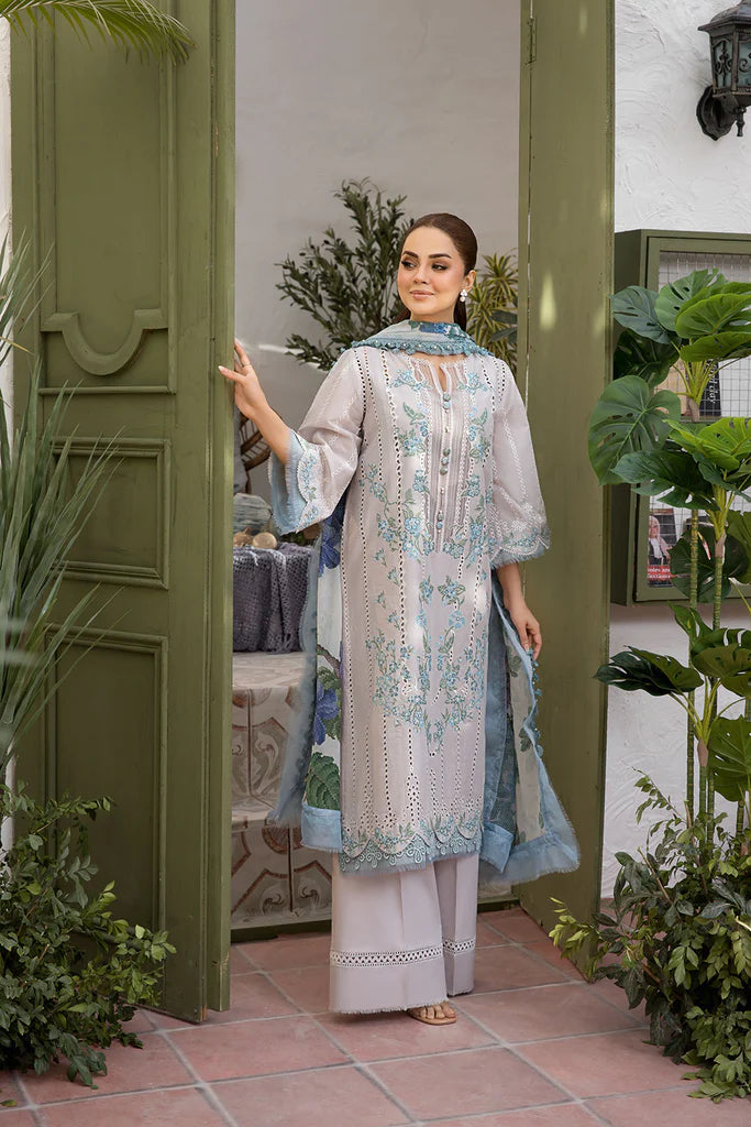 Model wearing Sobia Nazir Vital 2025 Design 2B in powder blue with delicate embroidery. Shop Pakistani luxury pret and Pakistani clothes online in UK.