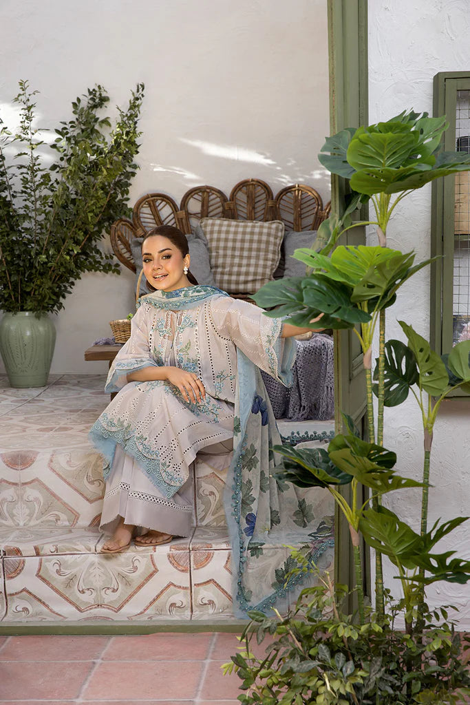 Model wearing Sobia Nazir Vital 2025 Design 2B in powder blue with delicate embroidery. Shop Pakistani luxury pret and Pakistani clothes online in UK.