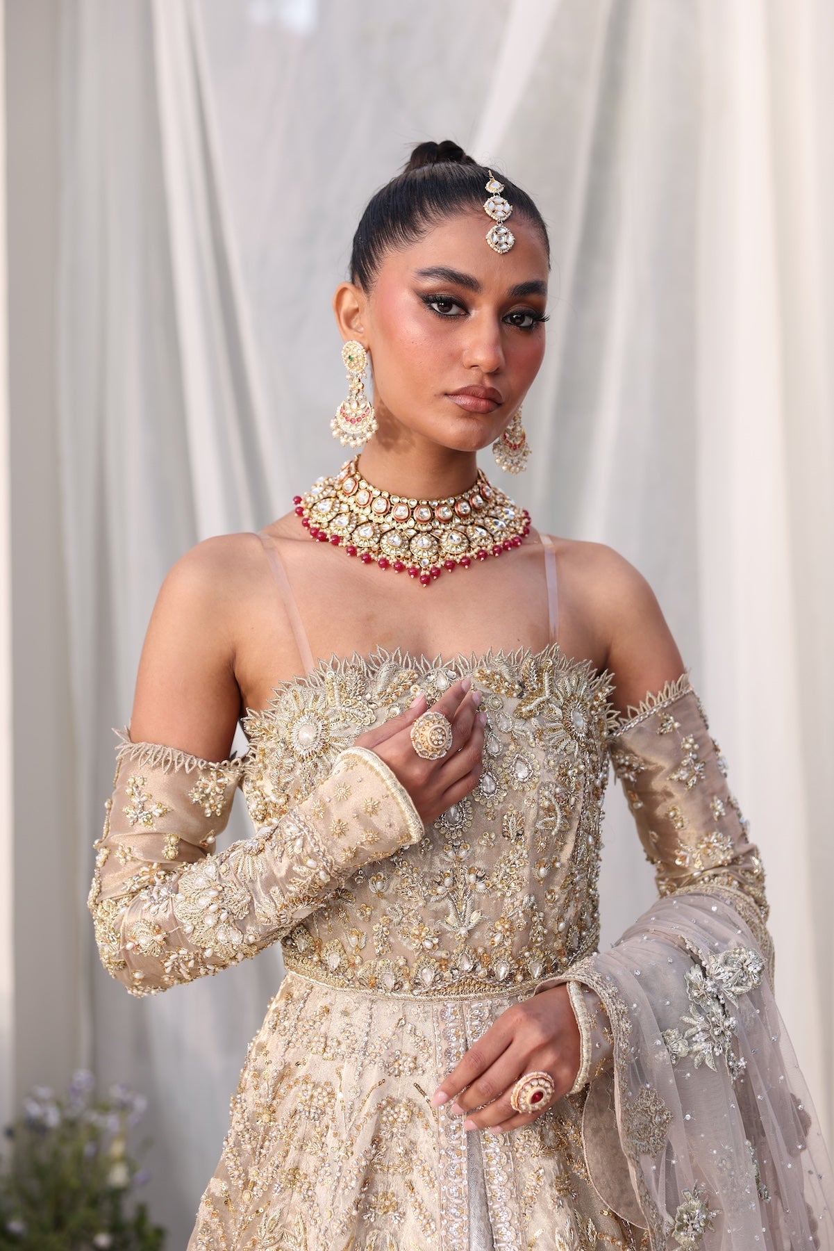 Model wearing champagne gold bridal gown Juni from Mysie By Tahira Wedding Edits '25, Pakistani luxury pret and clothes online in UK.