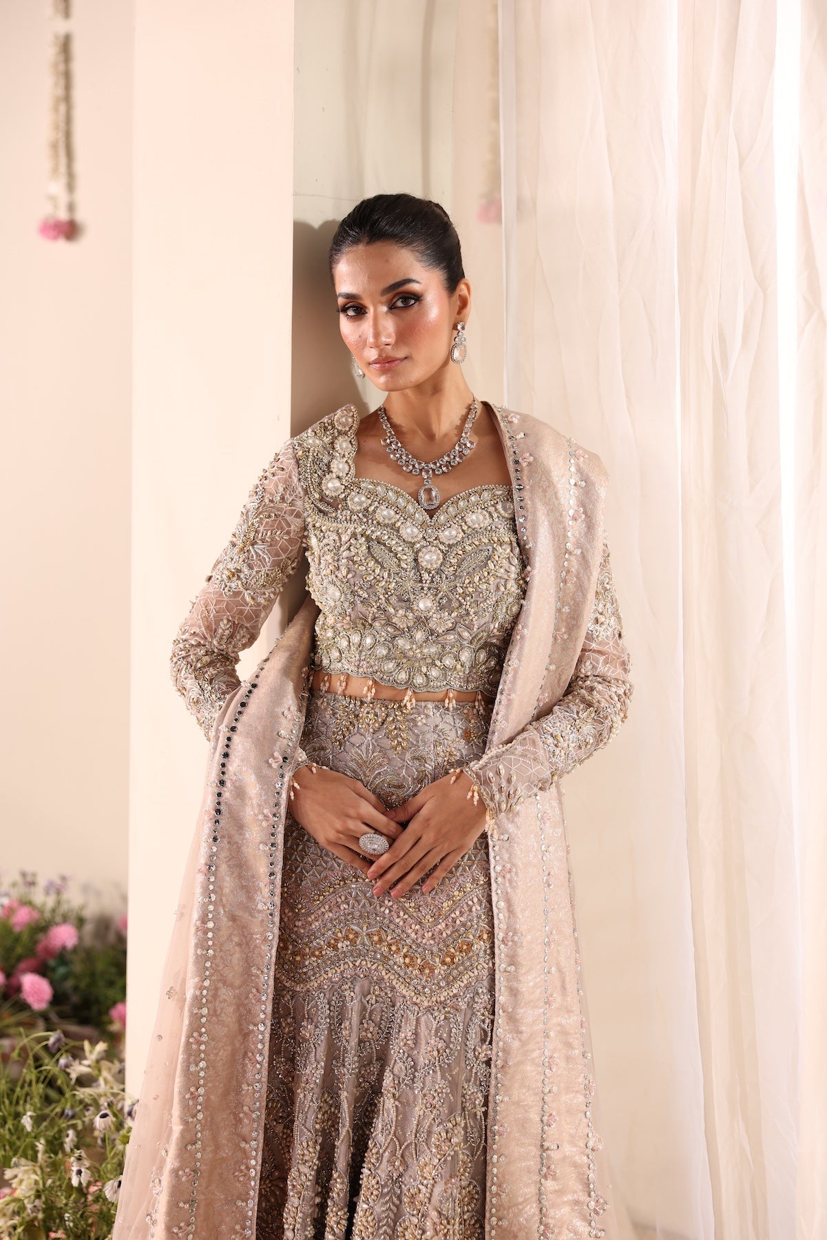 Model wearing silver and beige embellished bridal gown Salma from Mysie By Tahira Wedding Edits '25, Pakistani luxury pret online in UK.