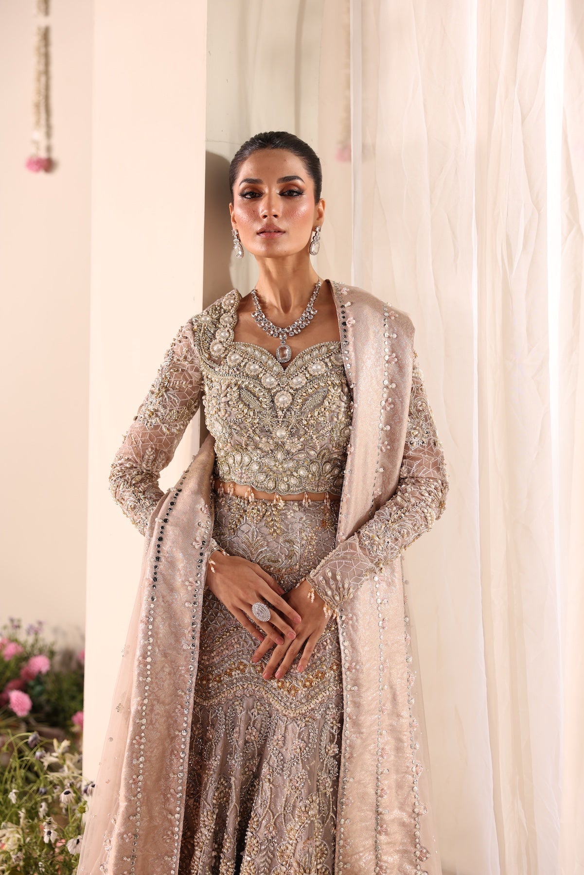 Model wearing silver and beige embellished bridal gown Salma from Mysie By Tahira Wedding Edits '25, Pakistani luxury pret online in UK.