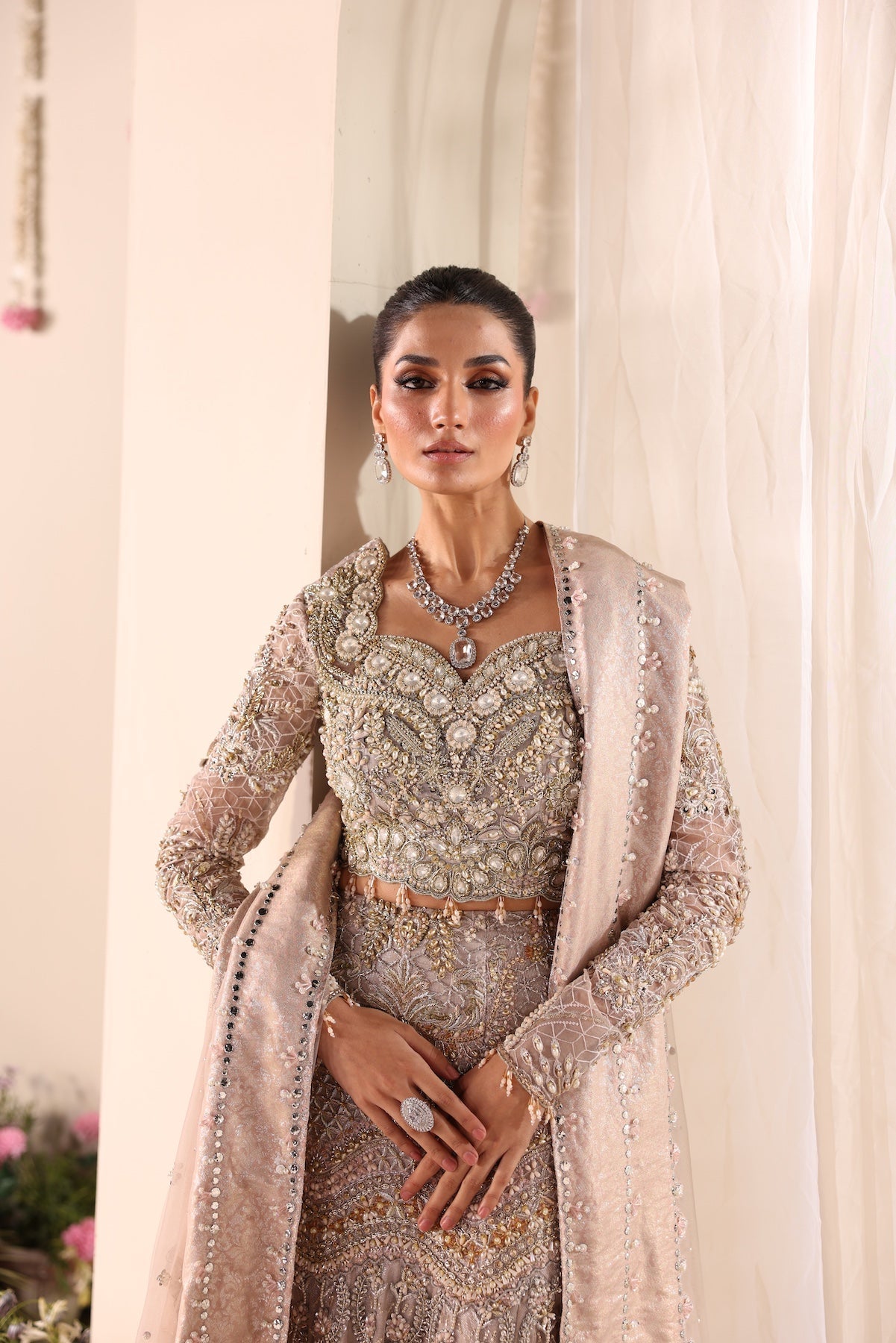Model wearing silver and beige embellished bridal gown Salma from Mysie By Tahira Wedding Edits '25, Pakistani luxury pret online in UK.