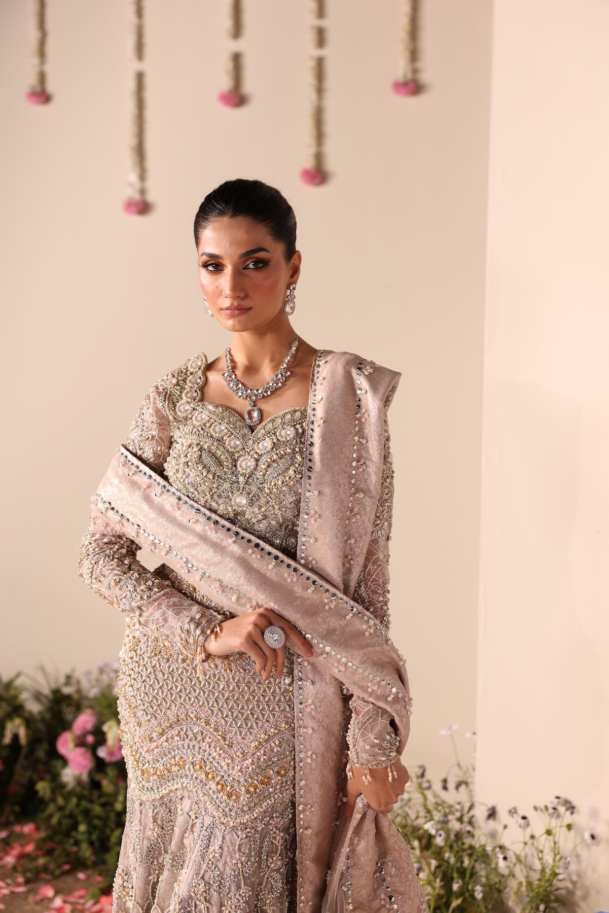 Model wearing silver and beige embellished bridal gown Salma from Mysie By Tahira Wedding Edits '25, Pakistani luxury pret online in UK.