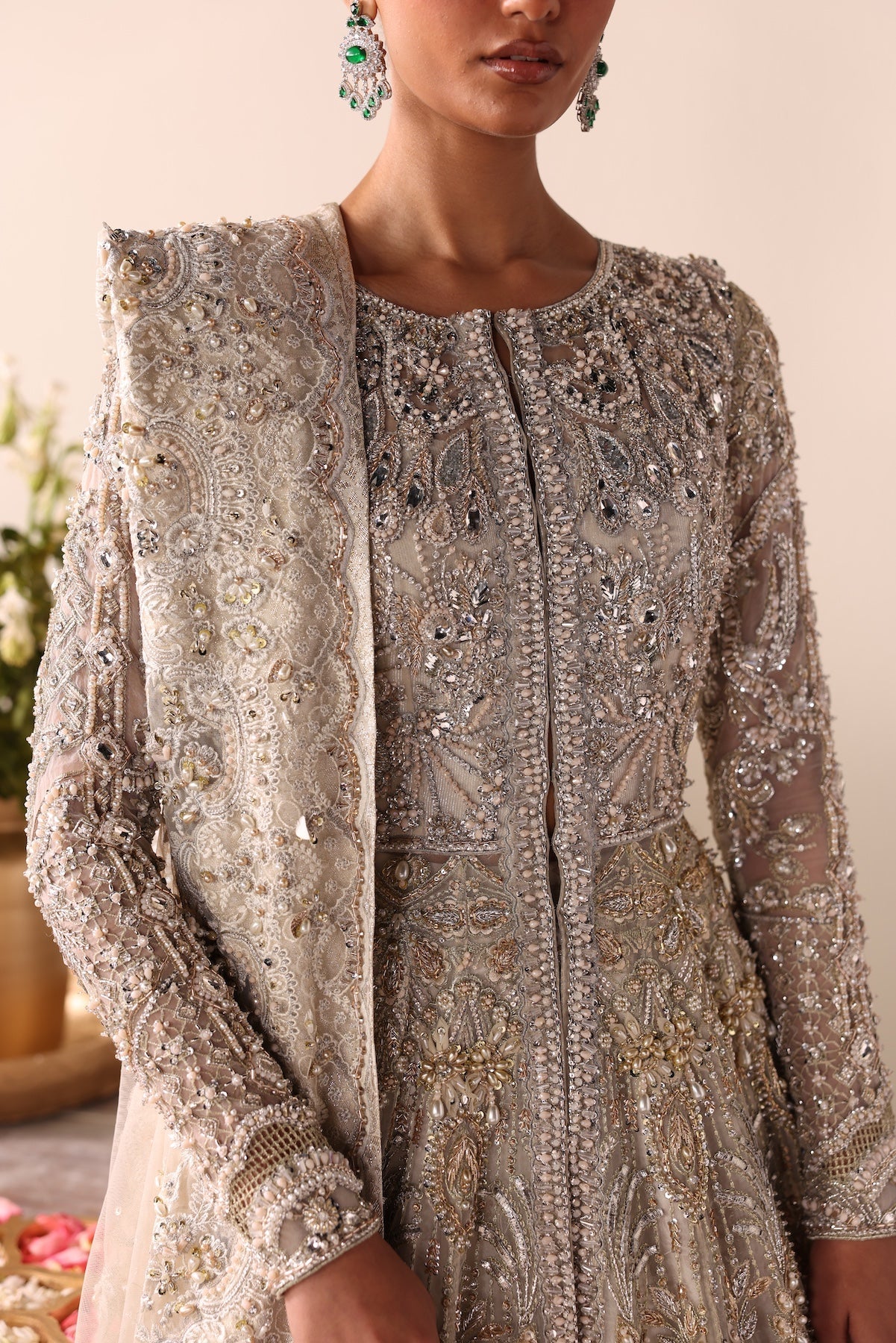 Model wearing champagne gold heavily embellished Elizabeth dress from Mysie By Tahira, Pakistani luxury pret and clothes online in UK.