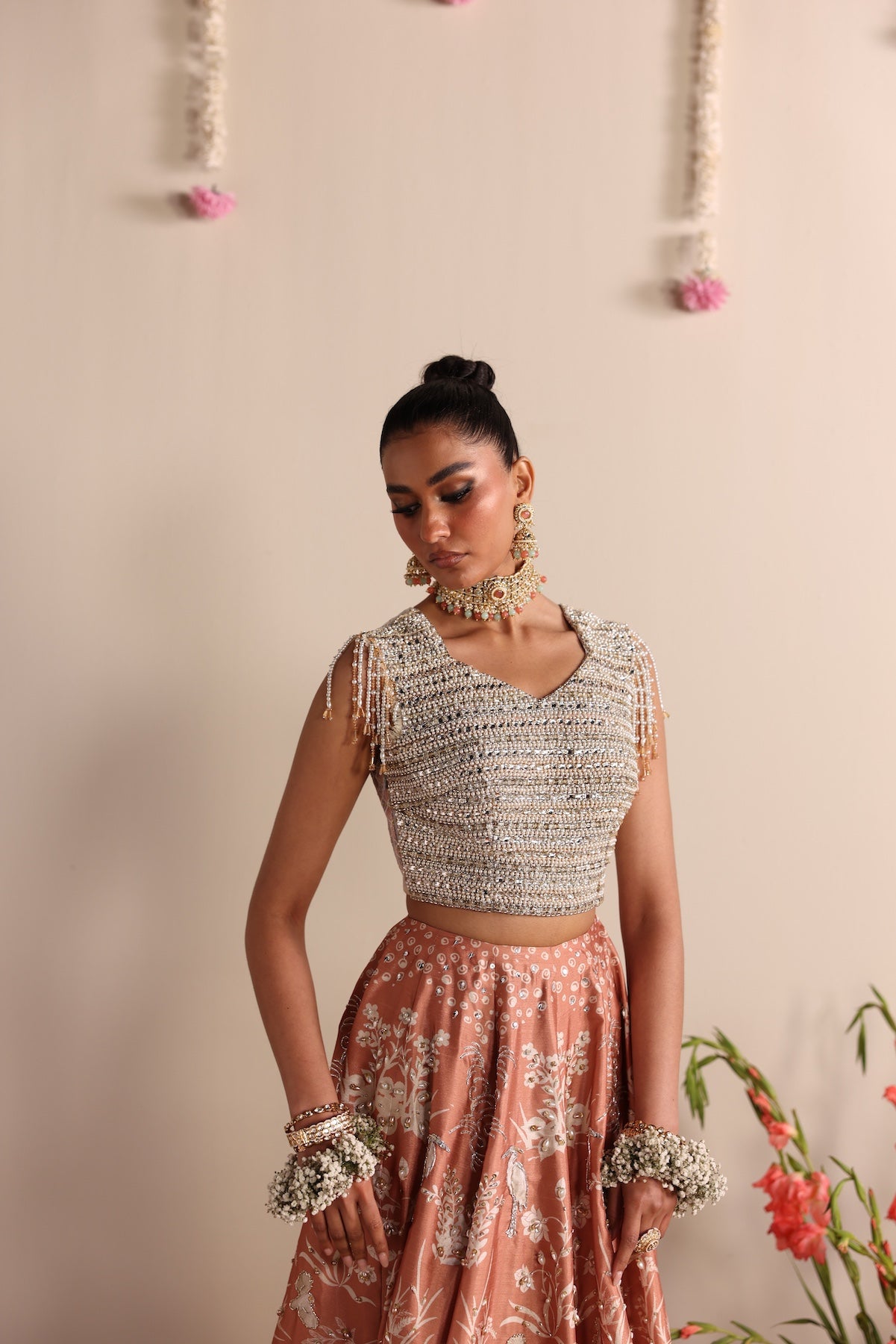 Model wearing silver and peach ombré lehenga set from Mysie By Tahira’s Dove design, Pakistani luxury pret and clothes online in UK.
