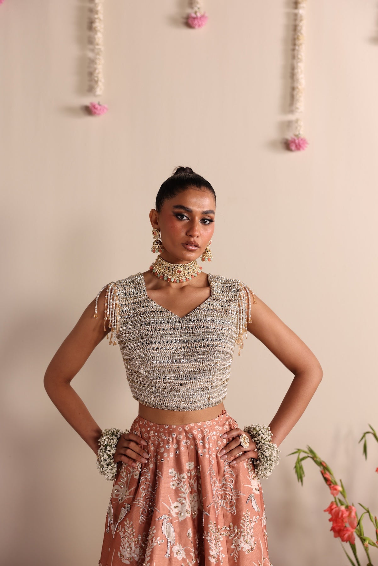 Model wearing silver and peach ombré lehenga set from Mysie By Tahira’s Dove design, Pakistani luxury pret and clothes online in UK.