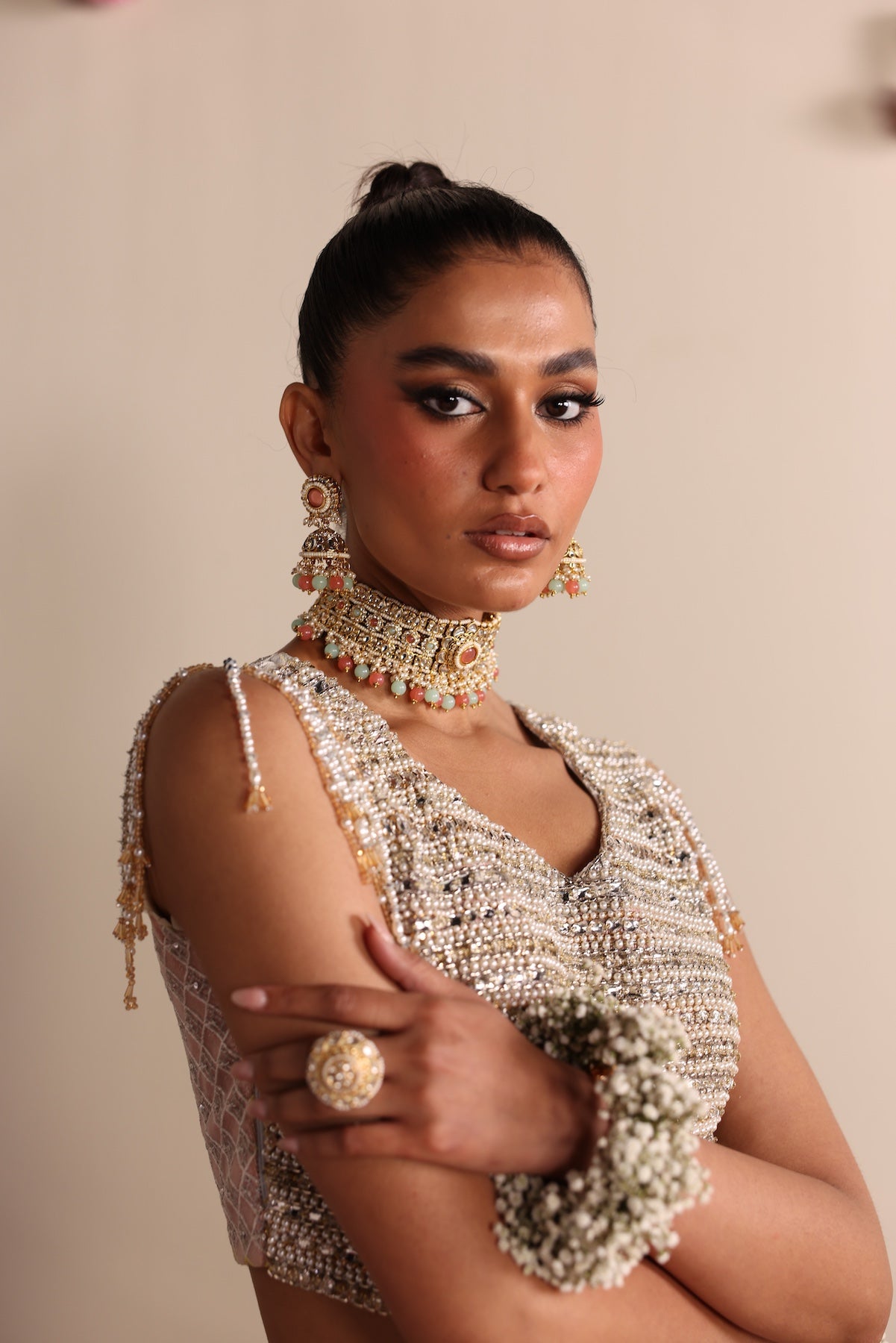 Model wearing silver and peach ombré lehenga set from Mysie By Tahira’s Dove design, Pakistani luxury pret and clothes online in UK.