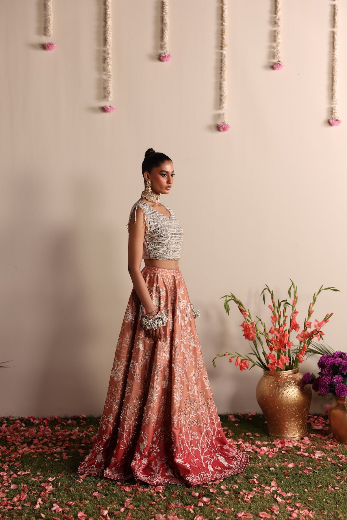 Model wearing silver and peach ombré lehenga set from Mysie By Tahira’s Dove design, Pakistani luxury pret and clothes online in UK.