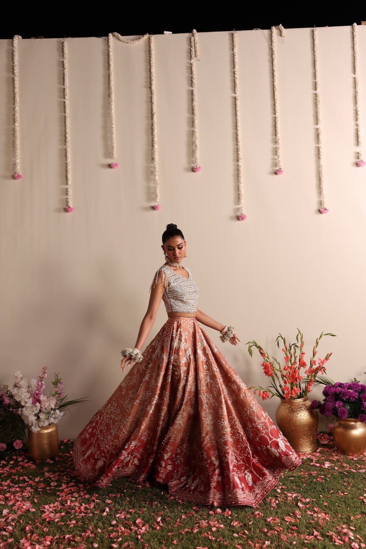 Model wearing silver and peach ombré lehenga set from Mysie By Tahira’s Dove design, Pakistani luxury pret and clothes online in UK.