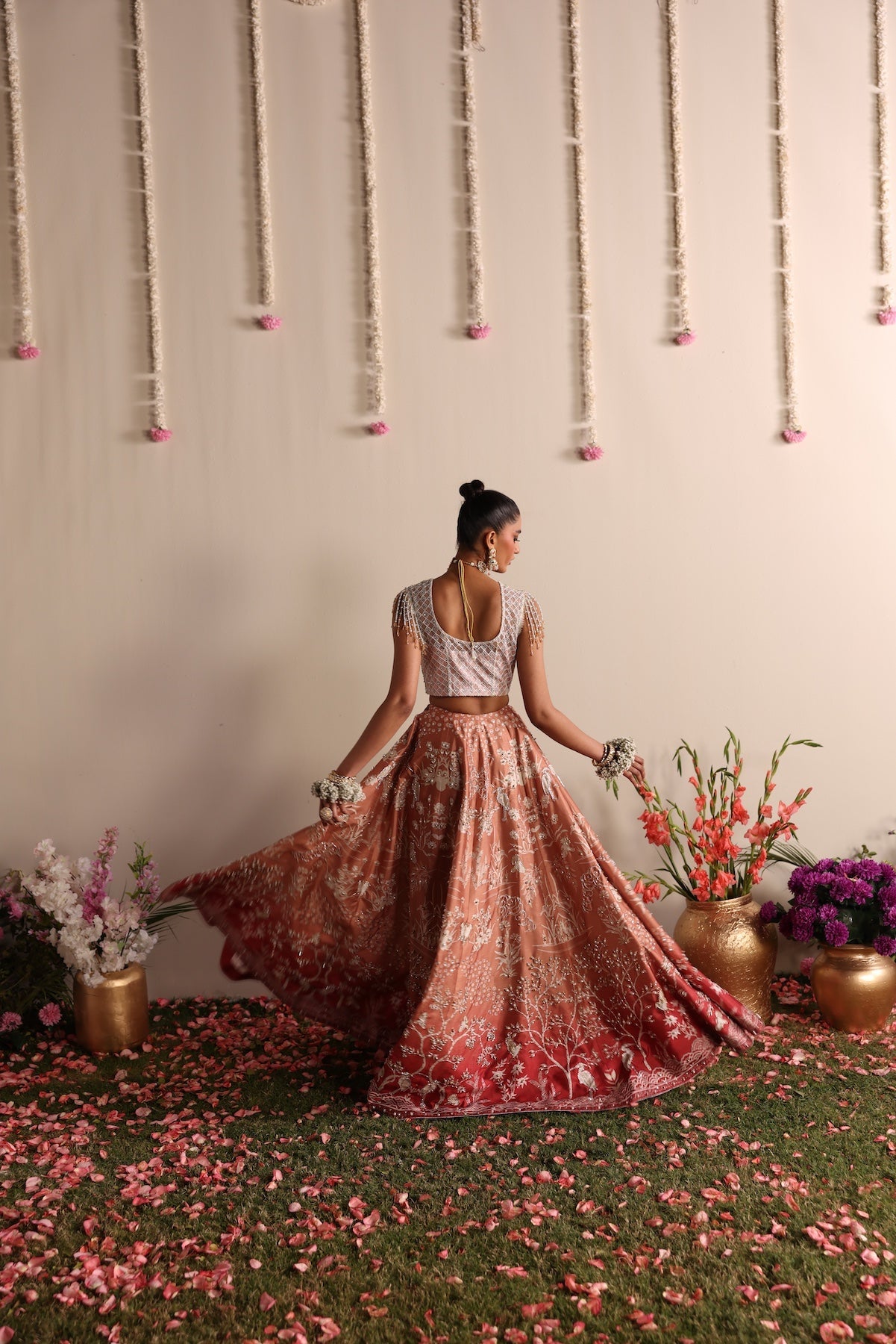 Model wearing silver and peach ombré lehenga set from Mysie By Tahira’s Dove design, Pakistani luxury pret and clothes online in UK.