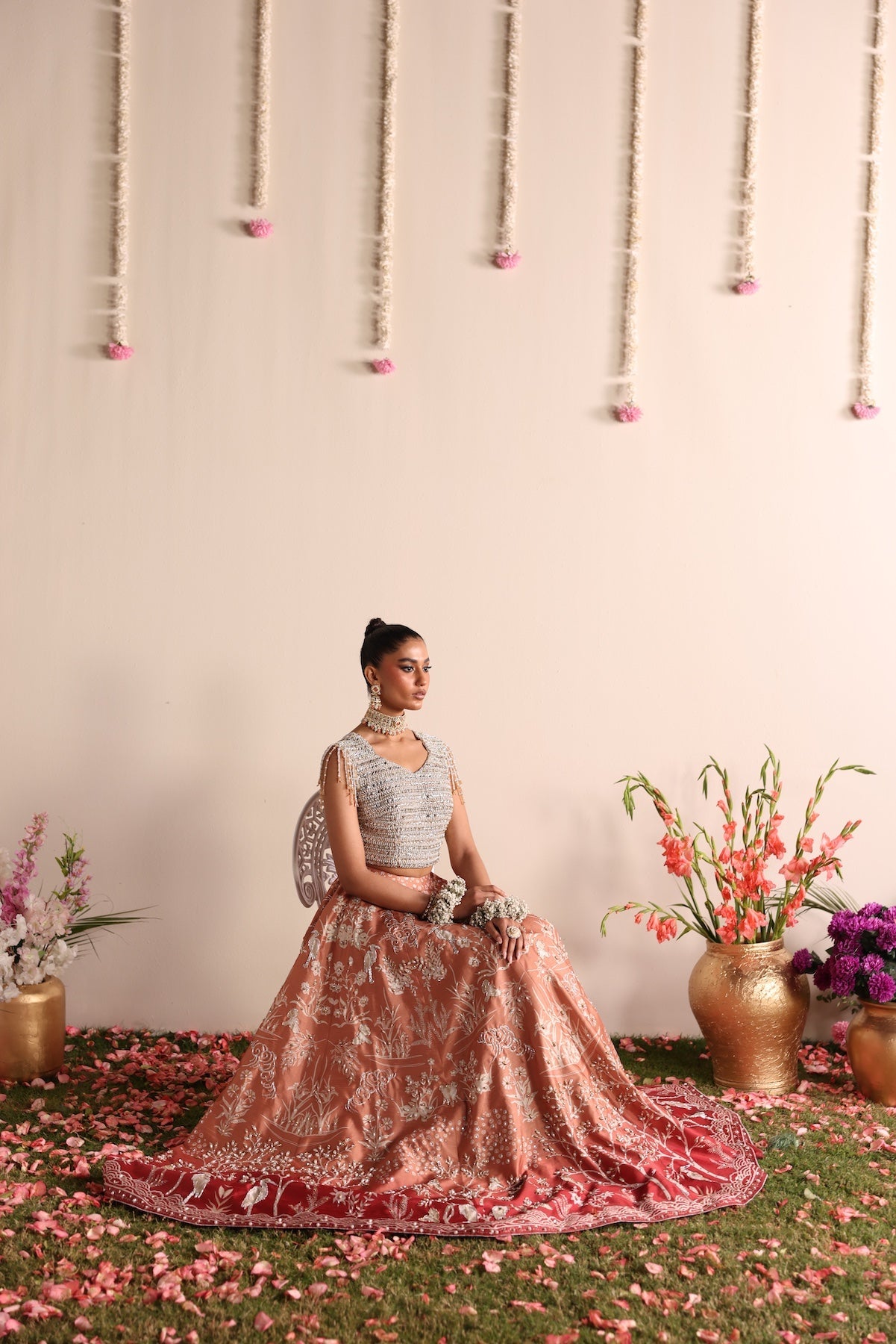 Model wearing silver and peach ombré lehenga set from Mysie By Tahira’s Dove design, Pakistani luxury pret and clothes online in UK.
