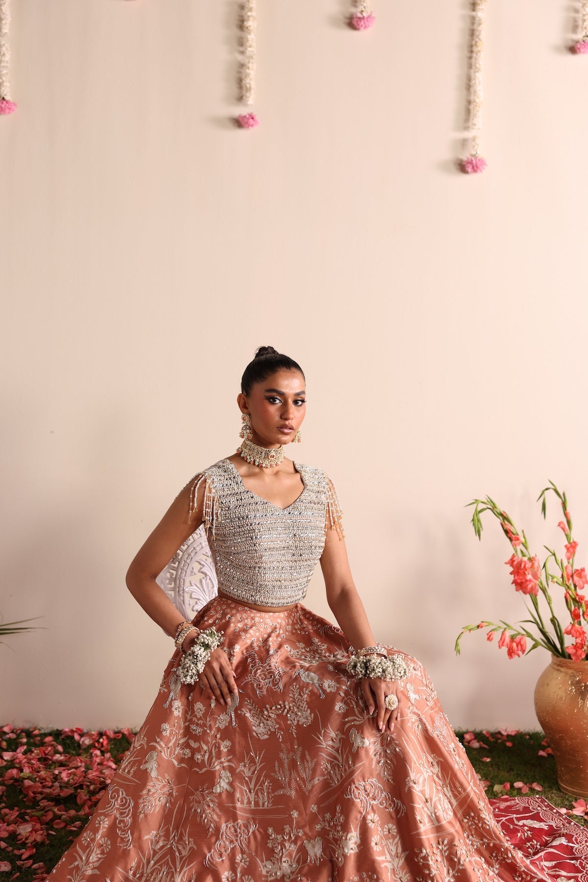 Model wearing silver and peach ombré lehenga set from Mysie By Tahira’s Dove design, Pakistani luxury pret and clothes online in UK.