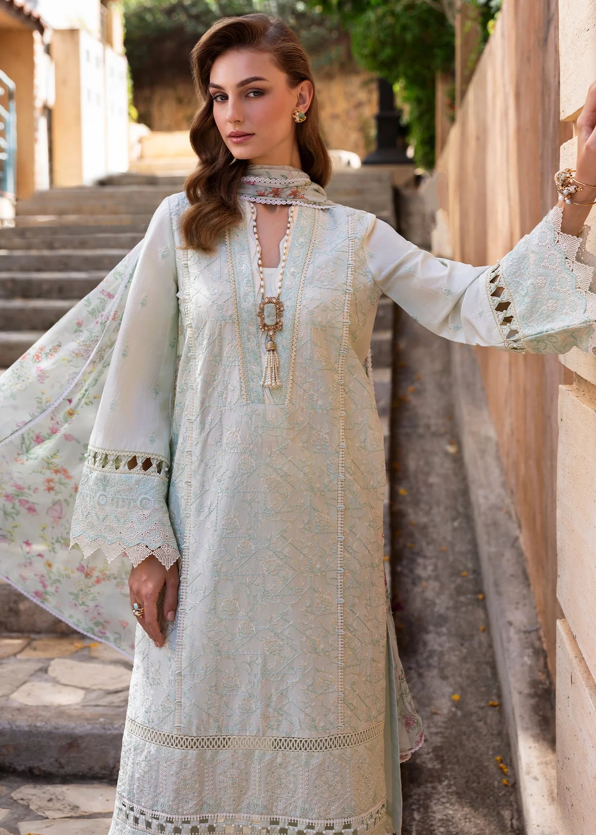 Model wearing Kanwal Malik Siena KM Basics '25 Mirel in pastel mint with floral embroidery. Shop Pakistani luxury pret online in the UK.