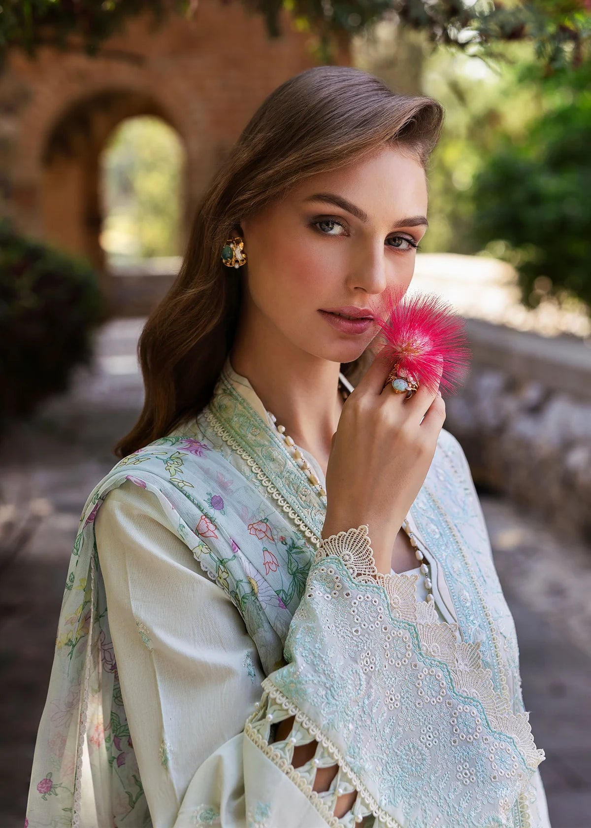 Model wearing Kanwal Malik Siena KM Basics '25 Mirel in pastel mint with floral embroidery. Shop Pakistani luxury pret online in the UK.