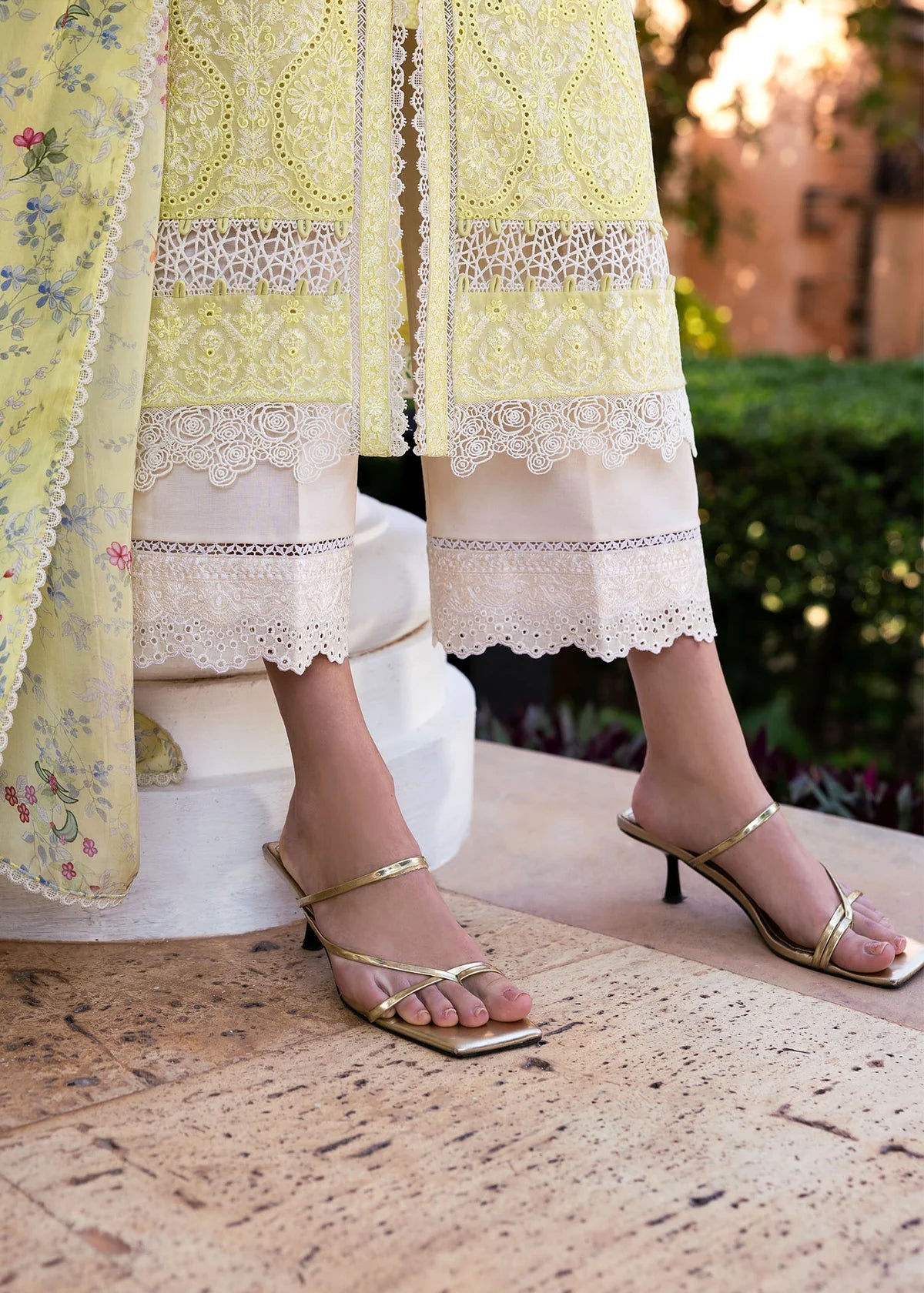 Model wearing Kanwal Malik Siena KM Basics '25 Celine in pastel yellow with floral embroidery. Shop Pakistani luxury pret online in the UK.