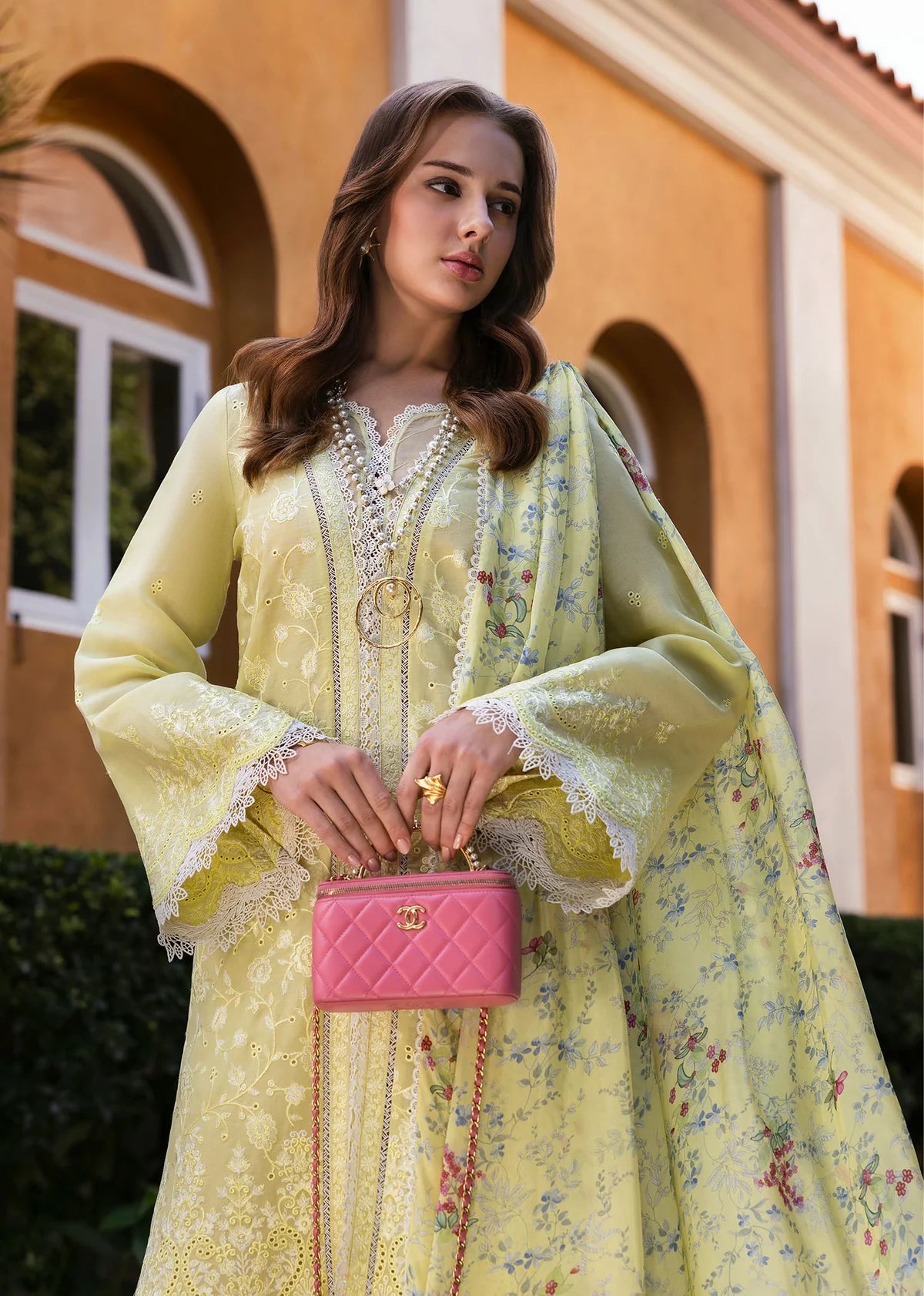 Model wearing Kanwal Malik Siena KM Basics '25 Celine in pastel yellow with floral embroidery. Shop Pakistani luxury pret online in the UK.