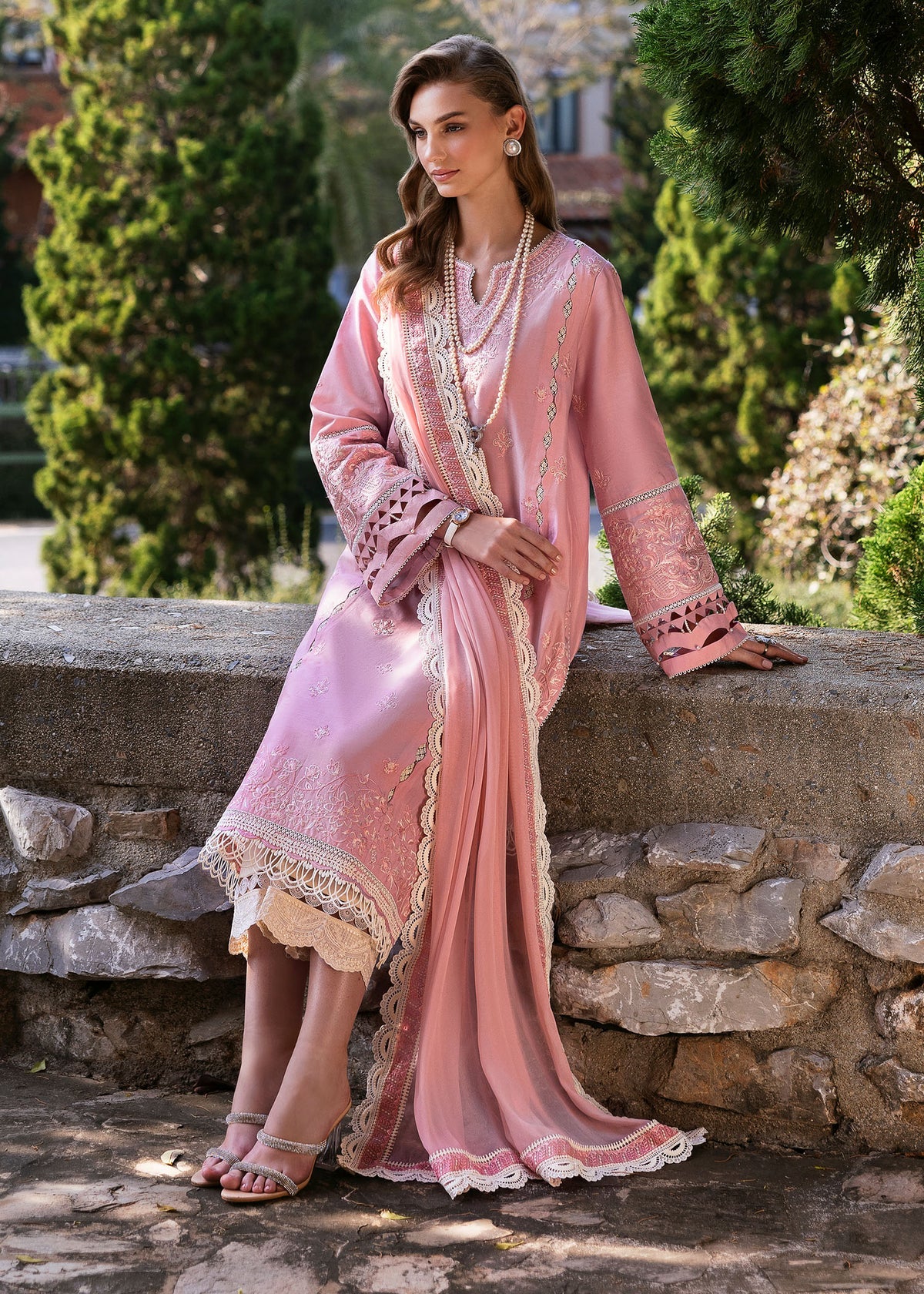 Model wearing Kanwal Malik Siena KM Basics '25 Flora in soft pink with delicate embroidery. Shop Pakistani luxury pret online in the UK.