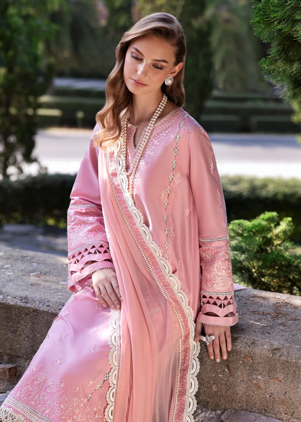 Model wearing Kanwal Malik Siena KM Basics '25 Flora in soft pink with delicate embroidery. Shop Pakistani luxury pret online in the UK.