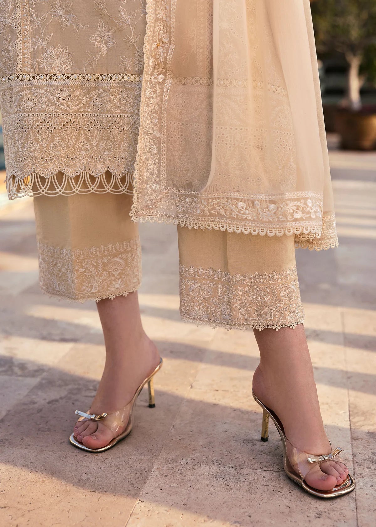 Model wearing Kanwal Malik Siena KM Basics '25 Sage in pastel beige with delicate embroidery. Shop Pakistani luxury pret online in the UK.