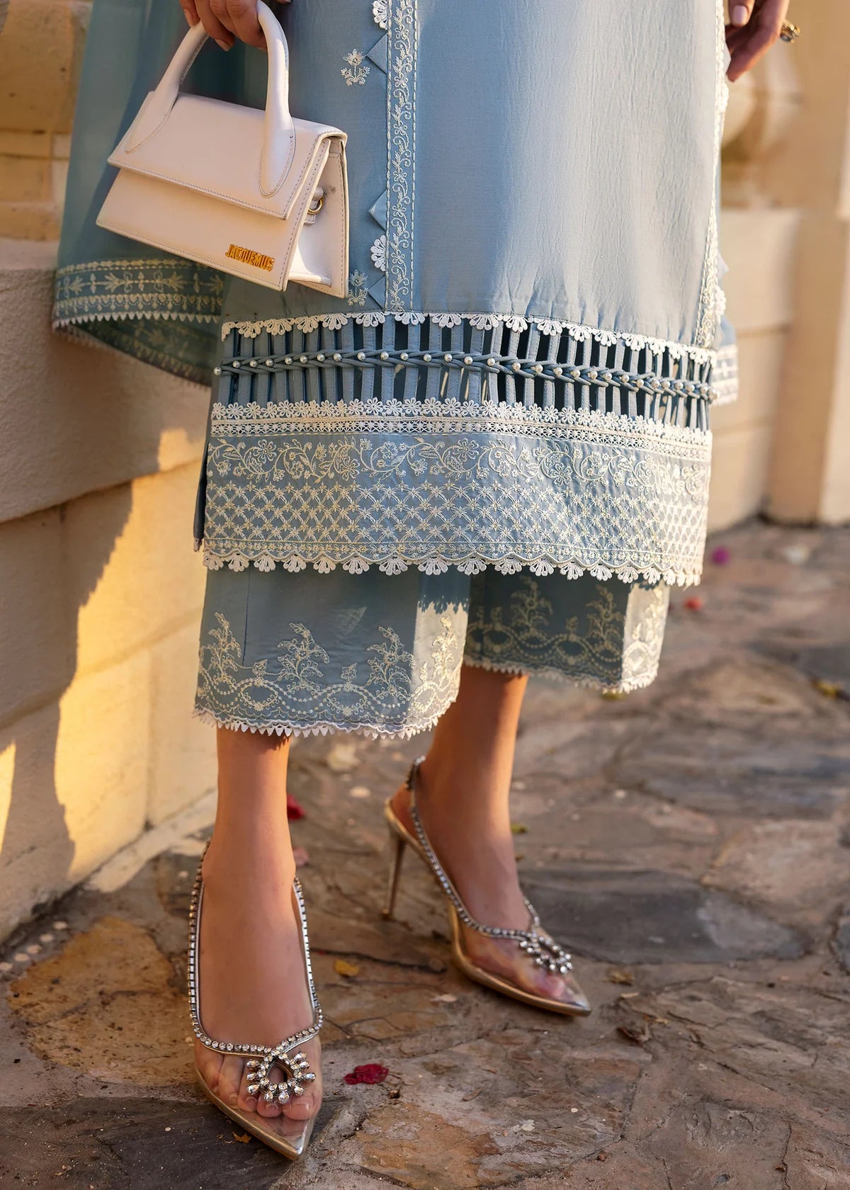 Model wearing Kanwal Malik Siena KM Basics '25 Kiara in pastel blue with delicate embroidery. Shop Pakistani luxury pret online in the UK.