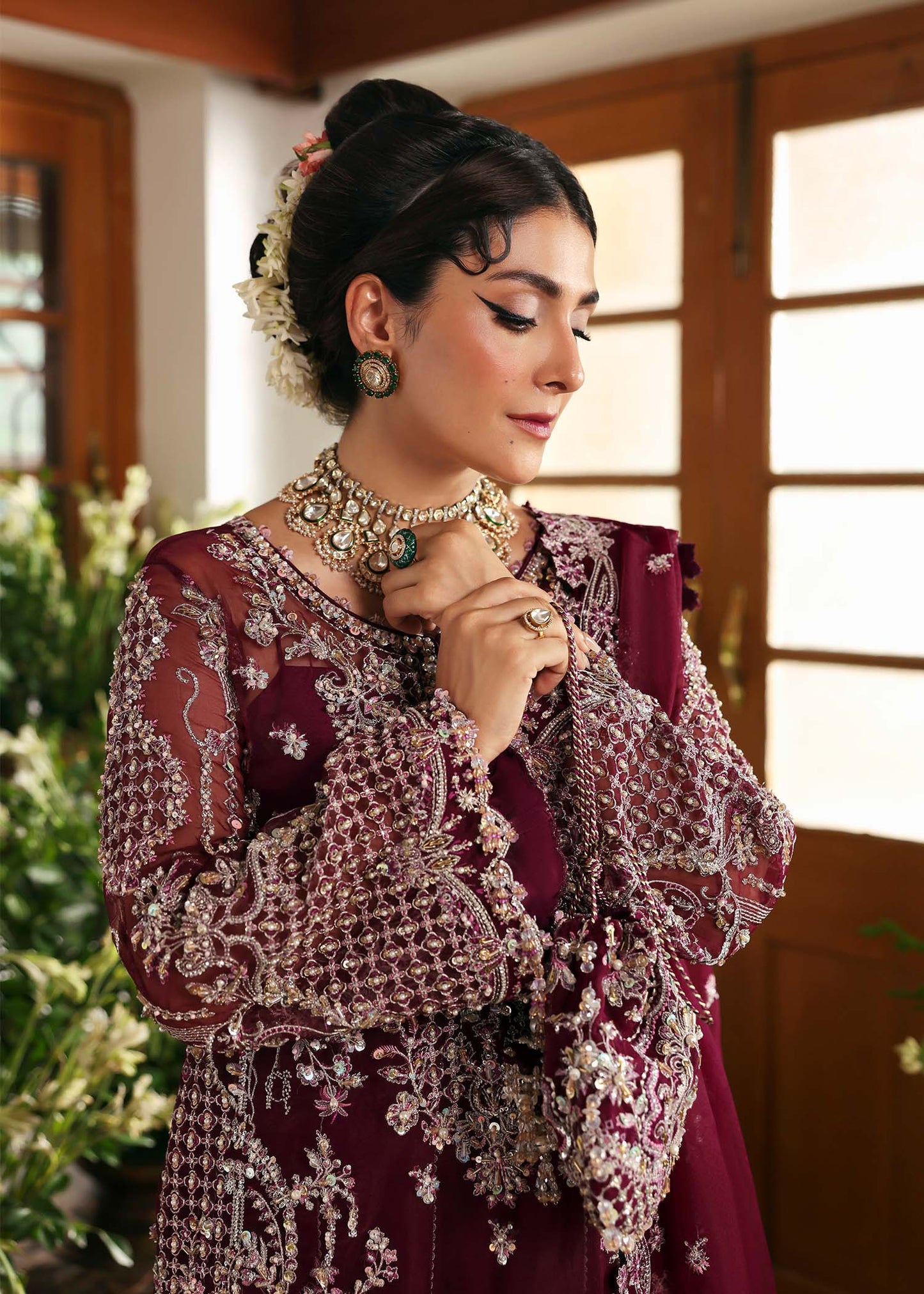 Model wearing Safiya by Kanwal Malik in deep maroon embroidered ensemble – Pakistani luxury pret outfit available online in UK.