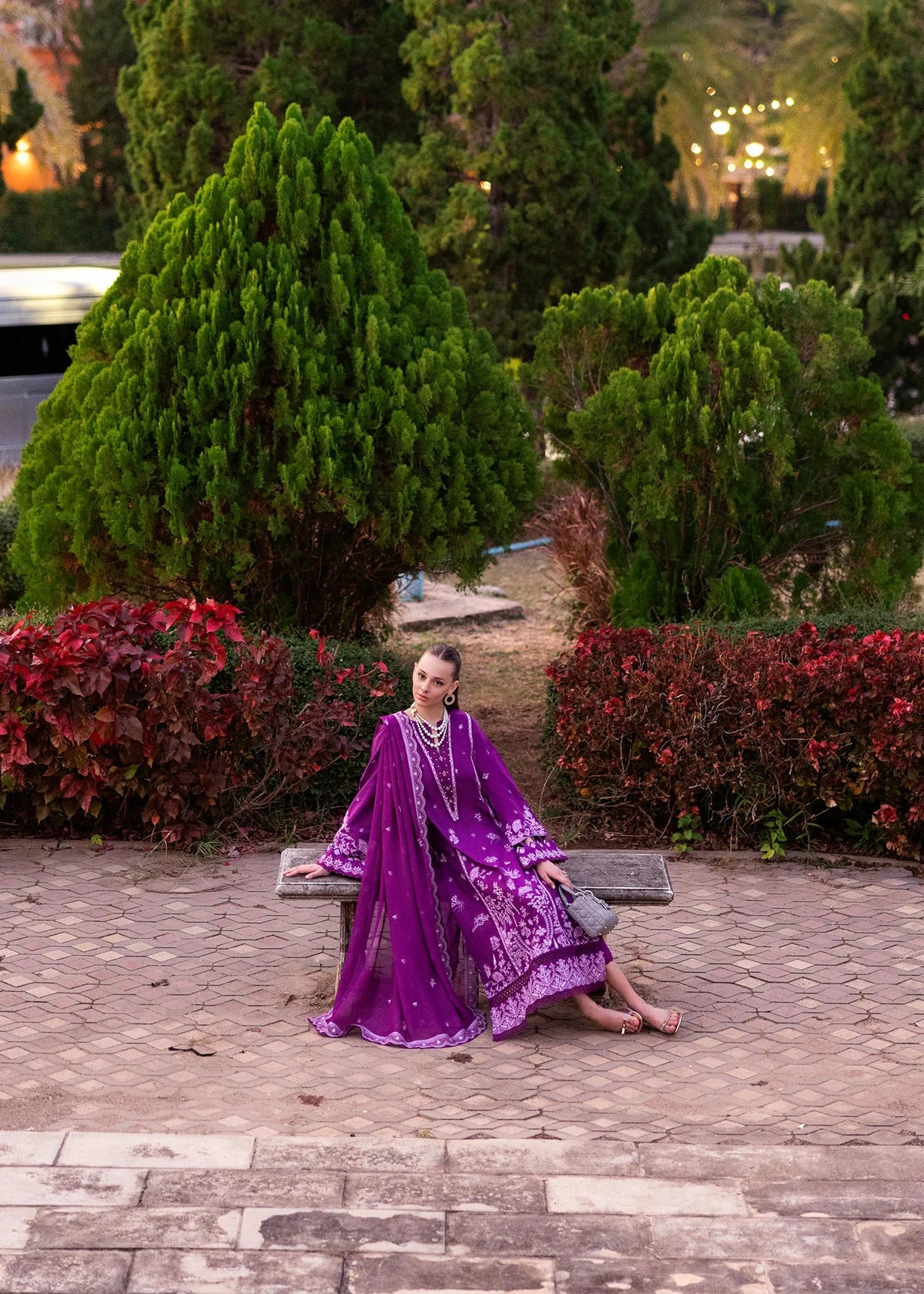 Model wearing Kanwal Malik Siena KM Basics '25 Cyra in purple with intricate embroidery. Shop Pakistani luxury pret online in the UK.