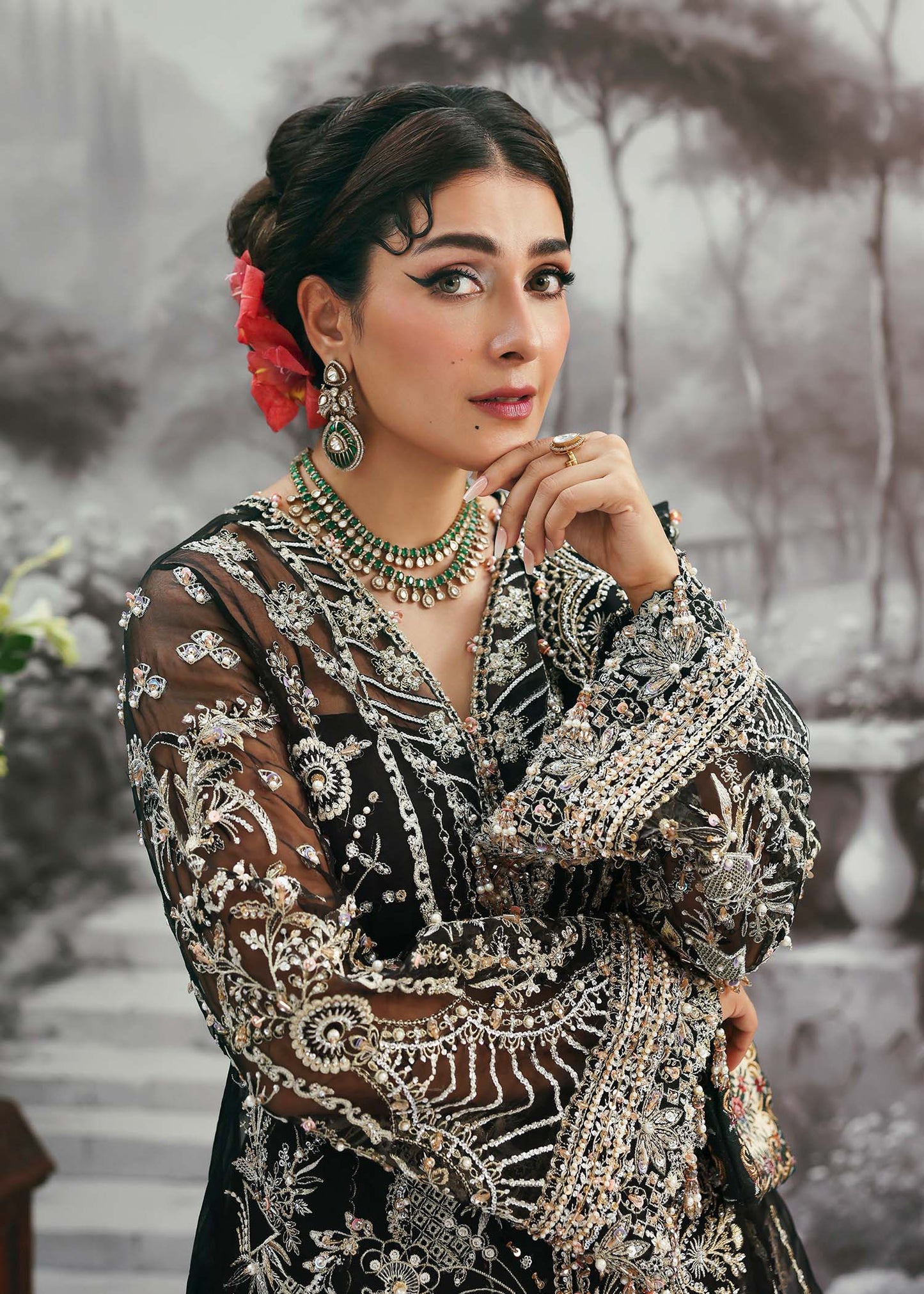 Model wearing Huriya by Kanwal Malik in black heavily embroidered outfit – Pakistani luxury pret available online in UK for festive wear.