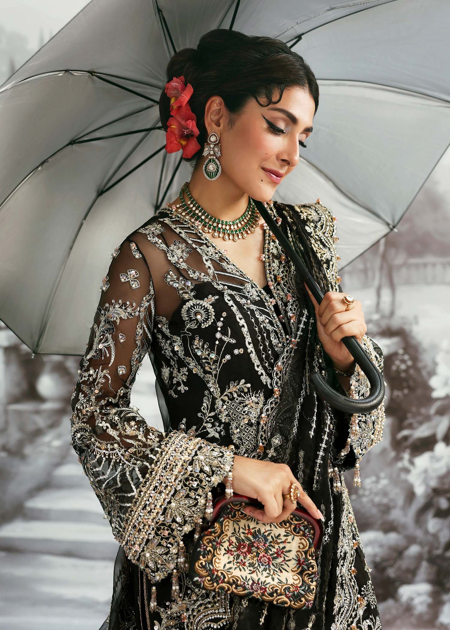 Model wearing Huriya by Kanwal Malik in black heavily embroidered outfit – Pakistani luxury pret available online in UK for festive wear.
