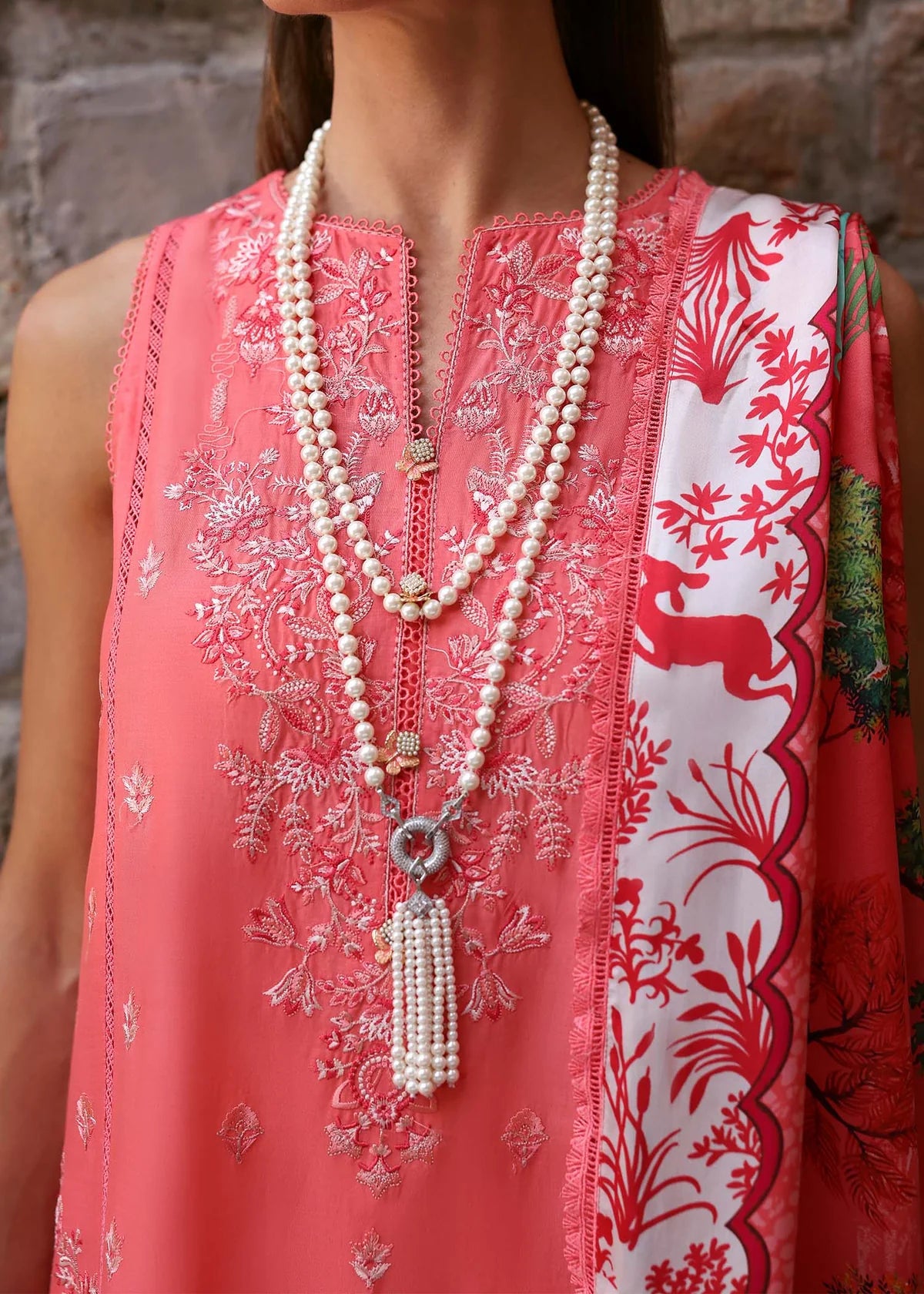 Model wearing coral red Aanya dress from Kanwal Malik Zaina Lawn '25, perfect for Pakistani luxury pret and Pakistani clothes online in UK.