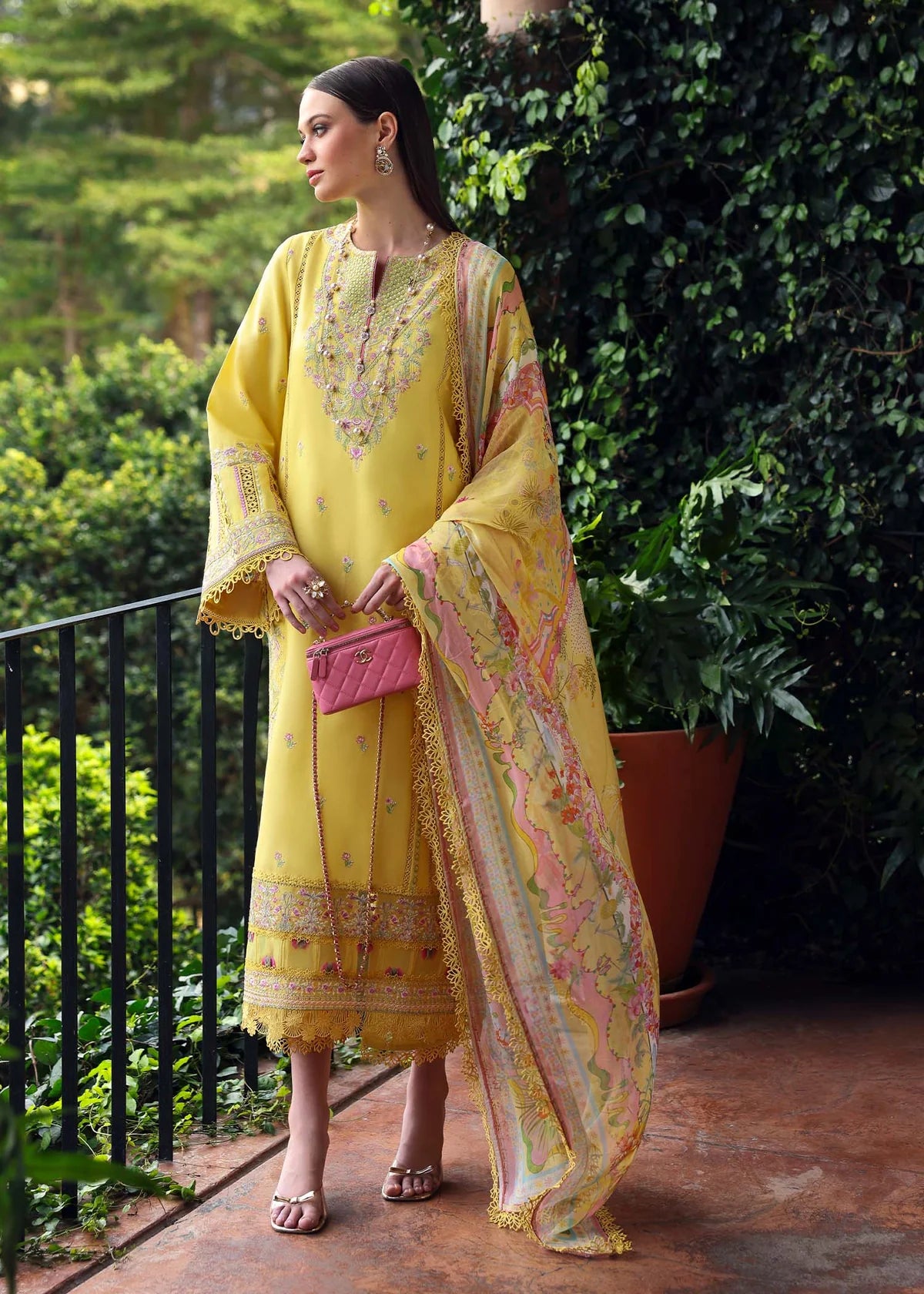 Model wearing yellow embroidered Raiha dress from Kanwal Malik Zaina Lawn '25, ideal for Pakistani luxury pret and clothes online in UK.