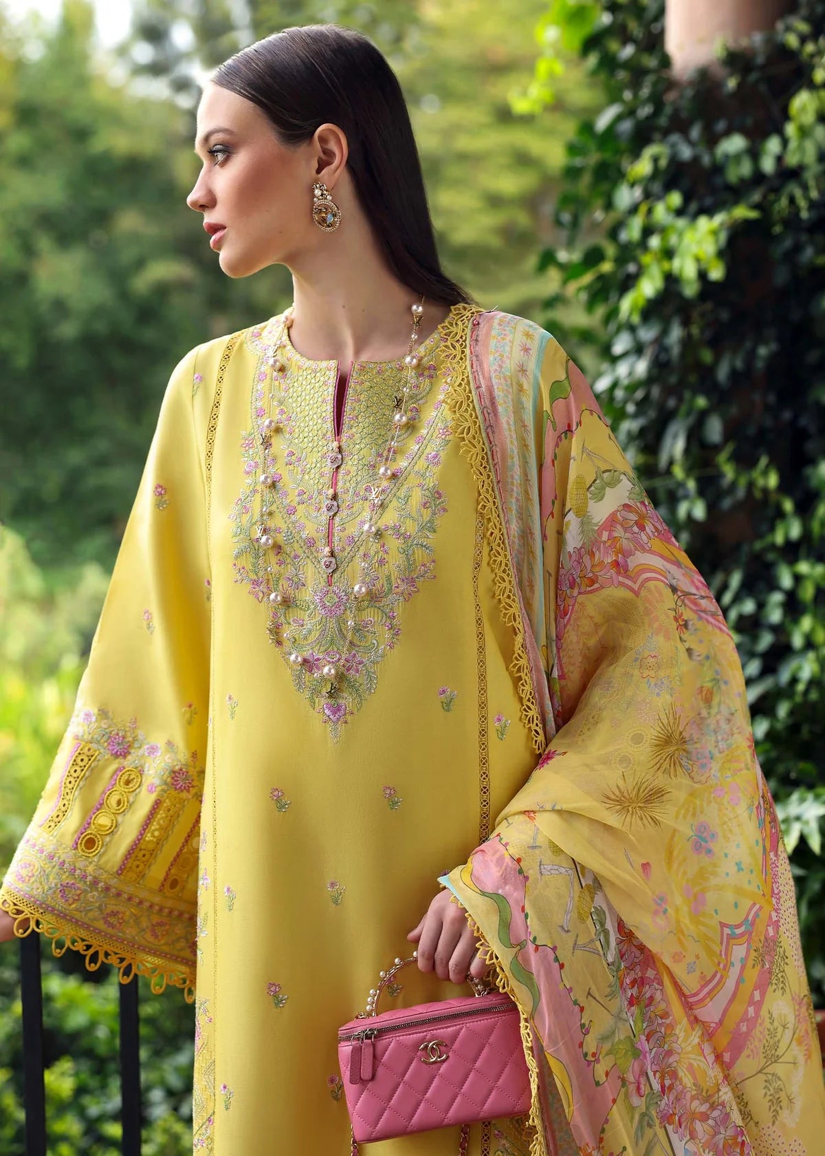 Model wearing yellow embroidered Raiha dress from Kanwal Malik Zaina Lawn '25, ideal for Pakistani luxury pret and clothes online in UK.