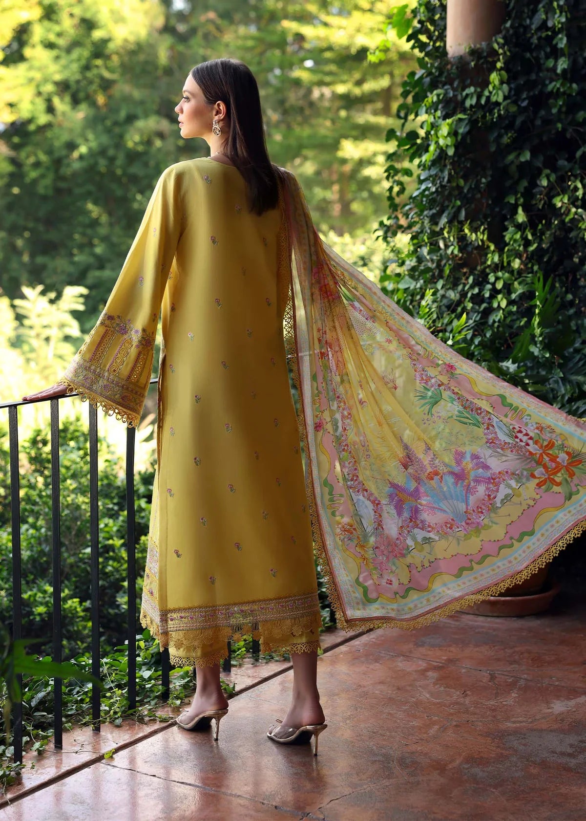 Model wearing yellow embroidered Raiha dress from Kanwal Malik Zaina Lawn '25, ideal for Pakistani luxury pret and clothes online in UK.