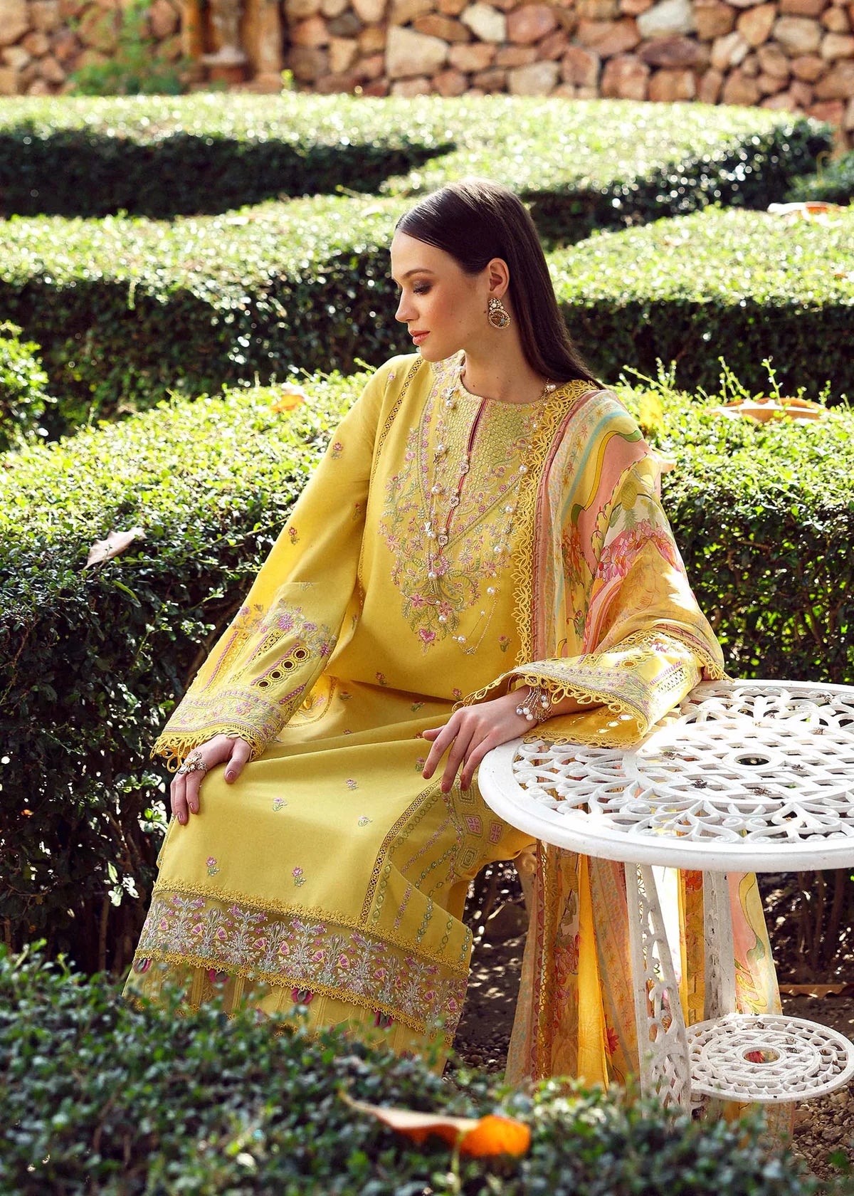 Model wearing yellow embroidered Raiha dress from Kanwal Malik Zaina Lawn '25, ideal for Pakistani luxury pret and clothes online in UK.